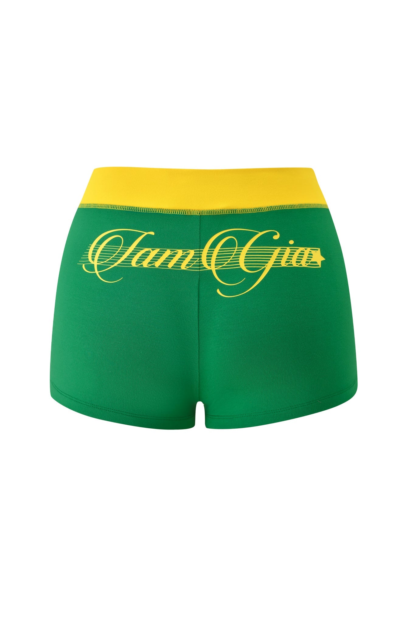 The BLARE PIPING SHORT - GREEN by I.AM.GIA features a wide yellow waistband and "Jamaica" in bold, cursive across the back. These green micro shorts are photographed on a clean white background.