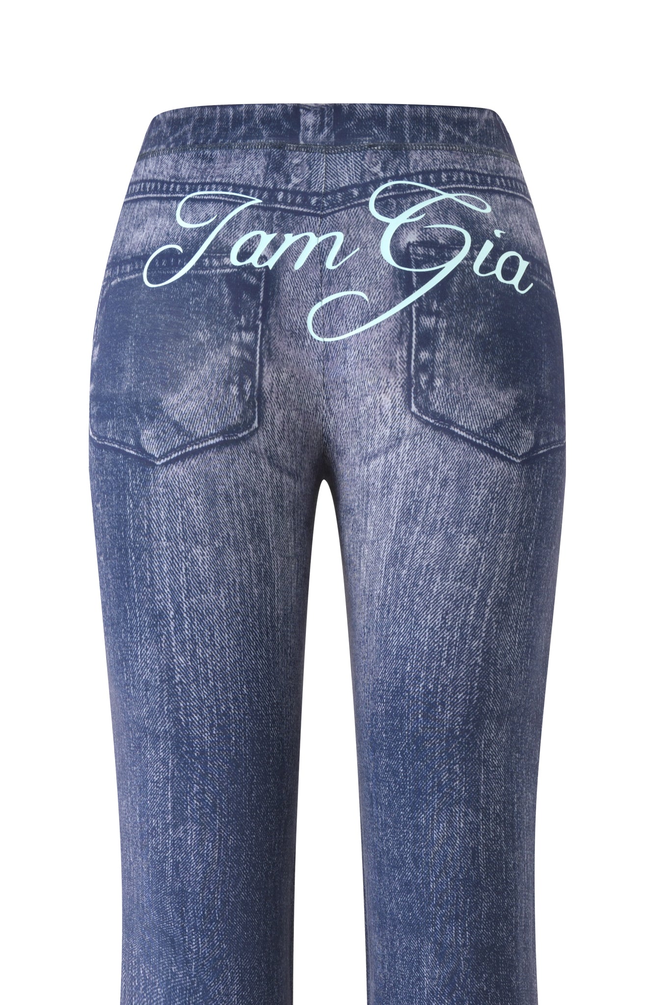 The I.AM.GIA BLARE TRACKPANT - DARK DENIM is crafted from soft bamboo fabric, with two back pockets and "Tam Gia" in large white cursive across the upper back.