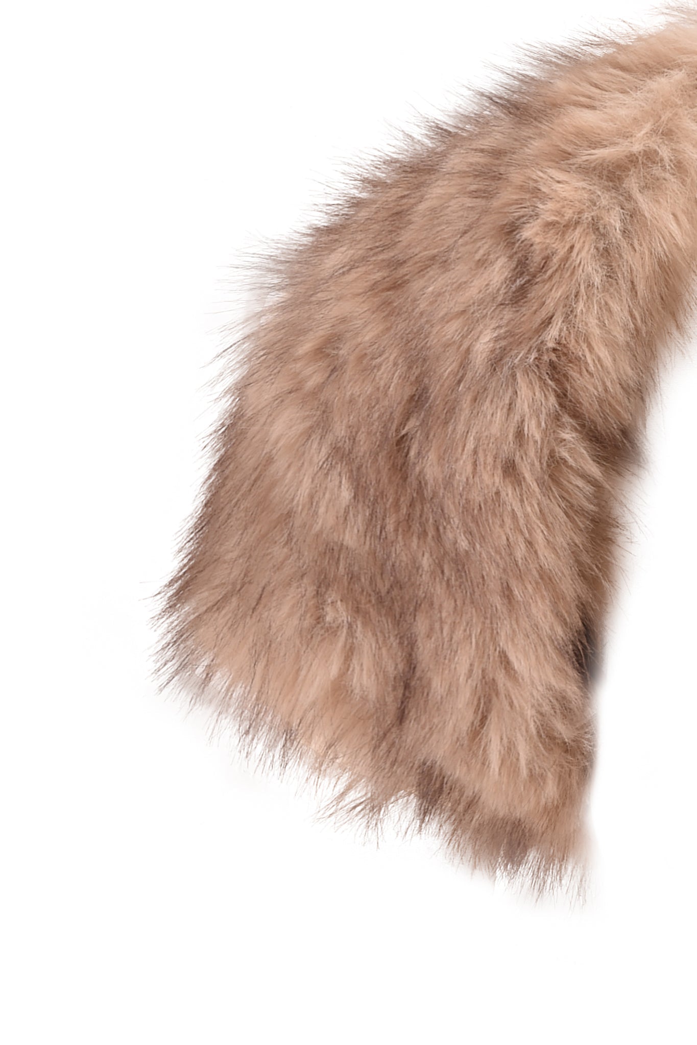 A close-up of the I.AM.GIA ALBA Faux Fur Cap Sleeve Bolero in taupe, featuring its fluffy, light brown texture against a white background.