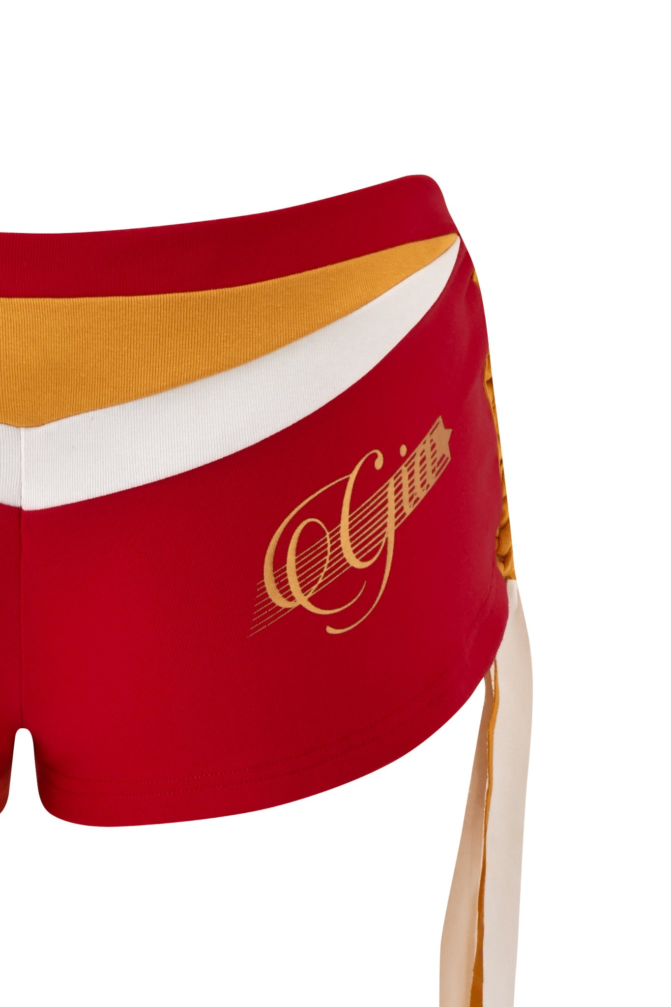 The image shows the NOVIA MICRO SPORT SHORT - RED by I.AM.GIA, featuring a gold and white low-rise waistband and "Gin" in gold script on the side. Only part of the lower body is visible.