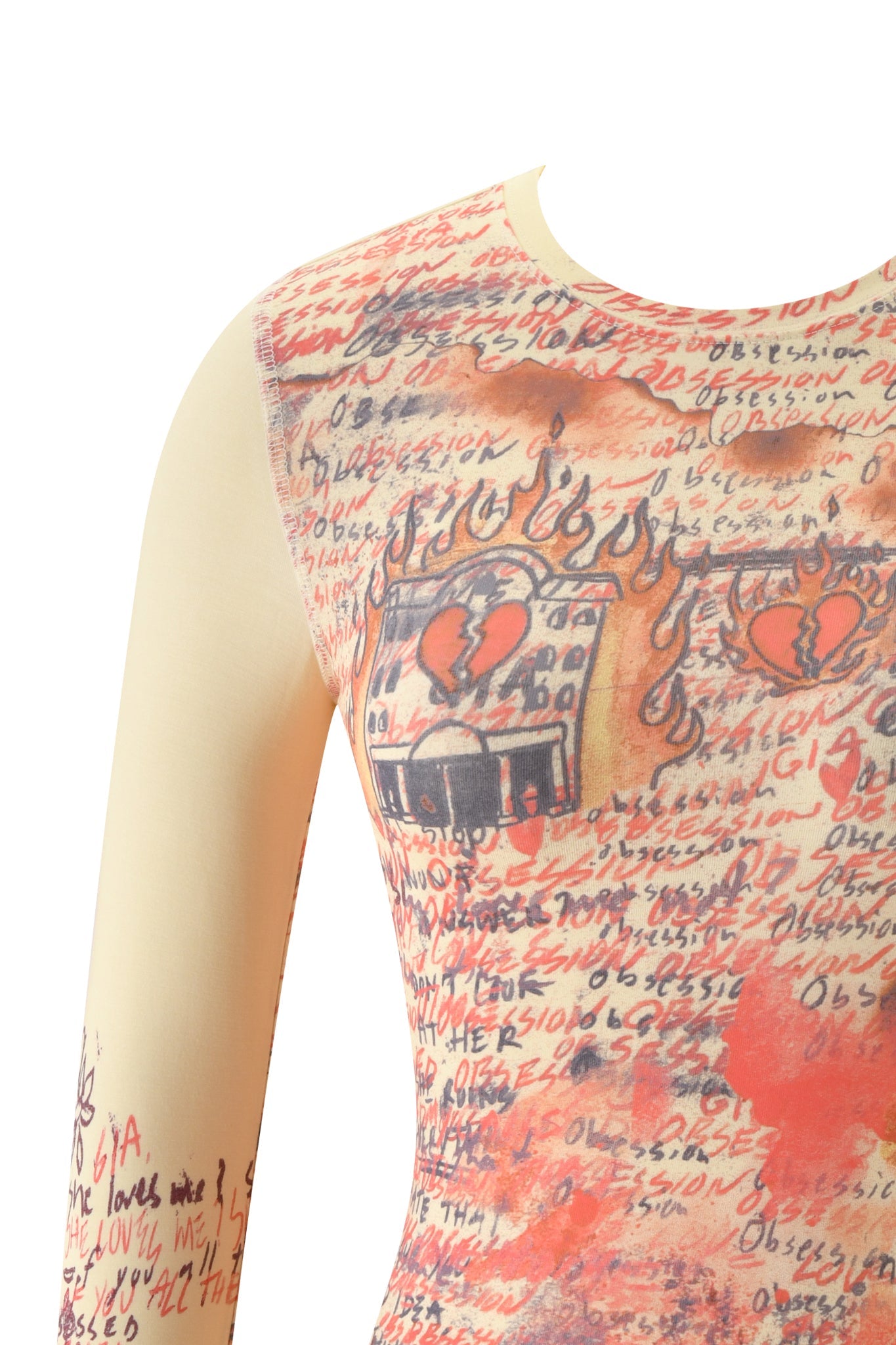 Close-up of the T-REX BLARE 2.0 LONG SLEEVE TEE by I.AM.GIA—a fitted, bodycon long sleeve top in yellow featuring an all over print of handwritten text, scribbles, and sketches—including broken hearts and flames—in red and black. Finished with a round neckline.