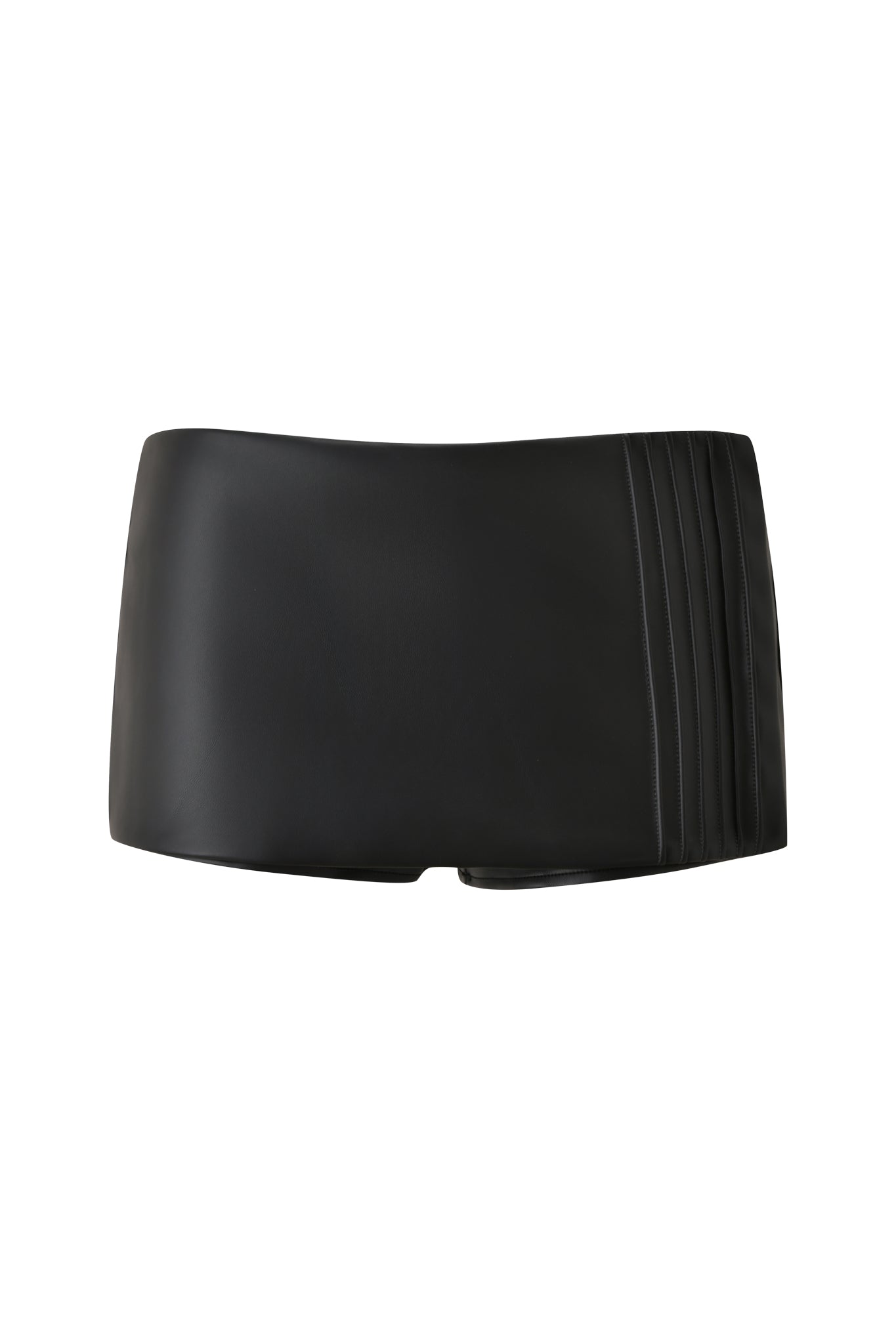 Styled by I.AM.GIA, the KESHA MICRO SKORT in black—a sleek faux leather skort with smooth finish and crisp horizontal detailing—stands out against a plain white background, exuding sophistication reminiscent of a classic black pleated cummerbund.