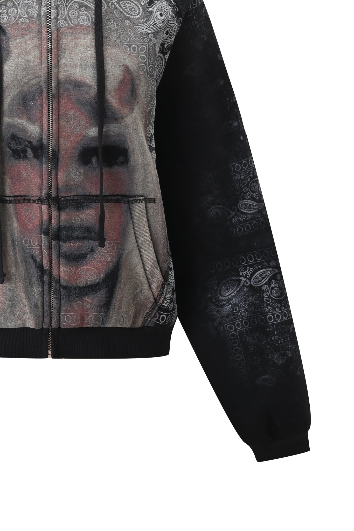 Introducing the T-REX ZIP THRU HOODIE - BLACK BANDANA by I.AM.GIA: an oversized street style hoodie in black featuring a bold, abstract face graphic on the front, accented with a striking paisley bandana pattern on the sleeve and framing the artwork. This zip-up effortlessly fuses standout graphics with classic bandana details for an iconic Black Bandana look.