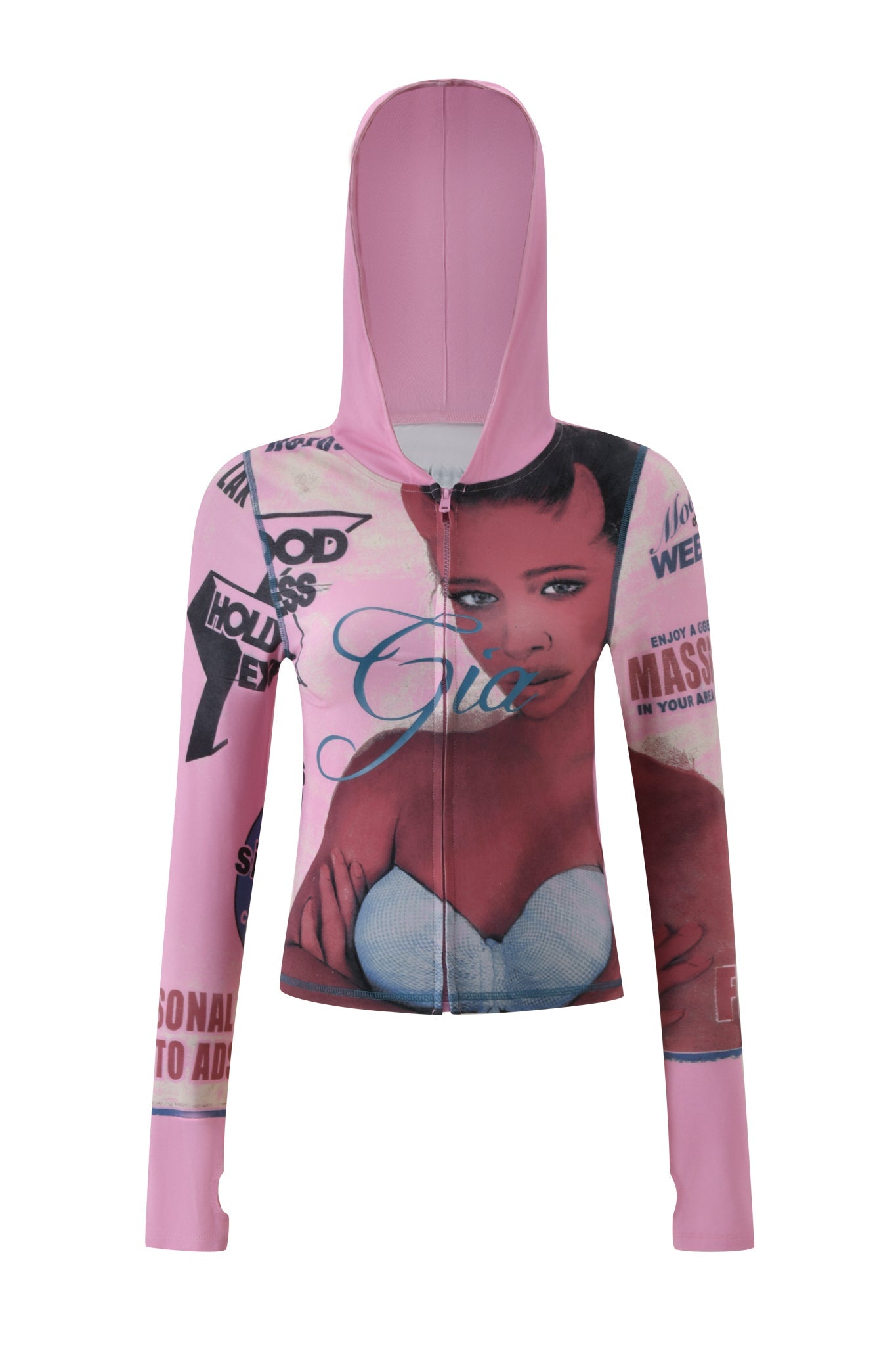 The T-REX BLARE HOODIE - PINK by I.AM.GIA is a baby pink zip-up hoodie featuring a printed graphic of a woman in a blue top, complemented by bold black-and-white graphics and magazine-style text.