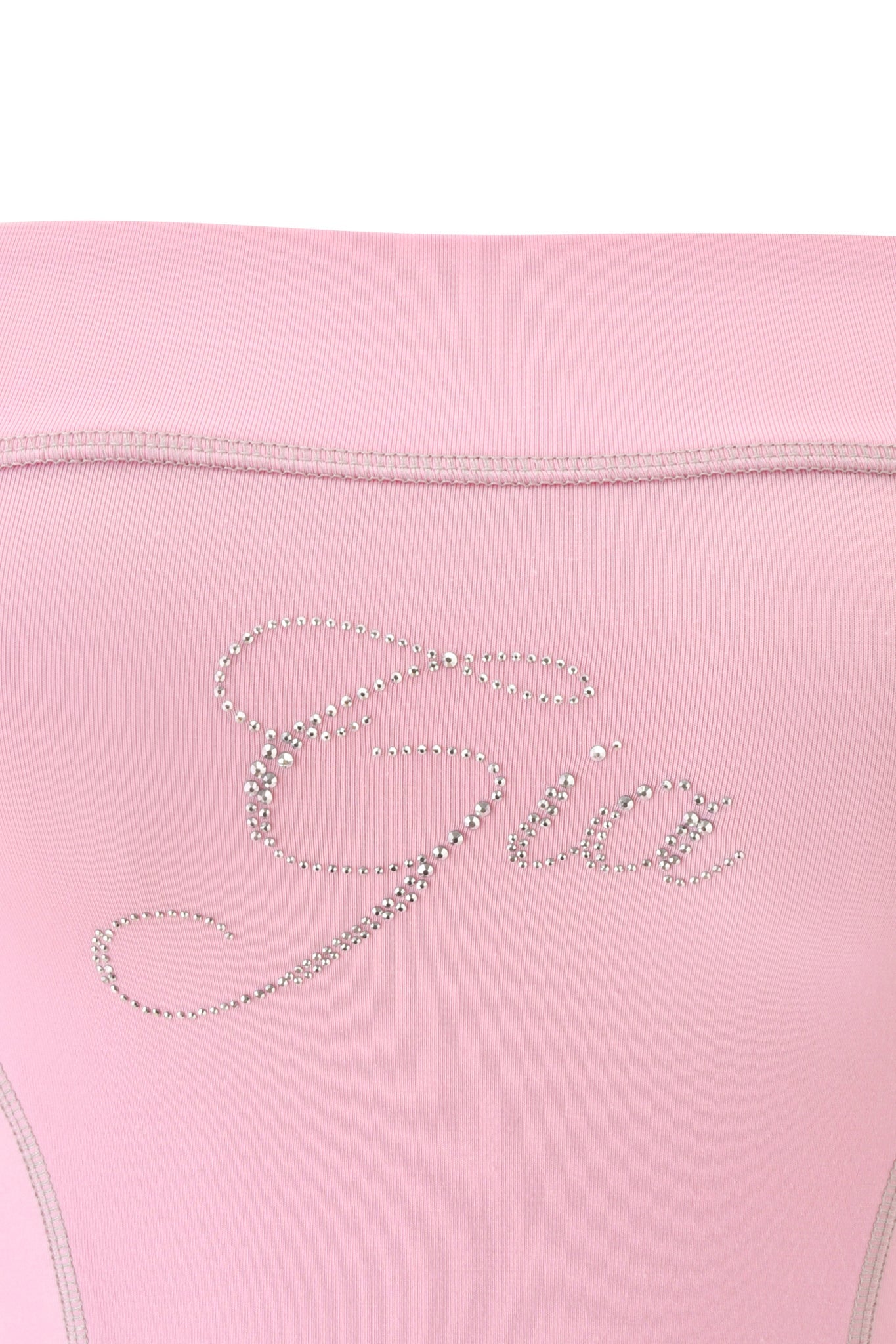 Close-up of the BLARE DIAMONTE BOOB TUBE in baby pink by I.AM.GIA, showcasing sparkling rhinestones spelling out “Gia” in decorative cursive lettering, crafted in the brand’s signature style.