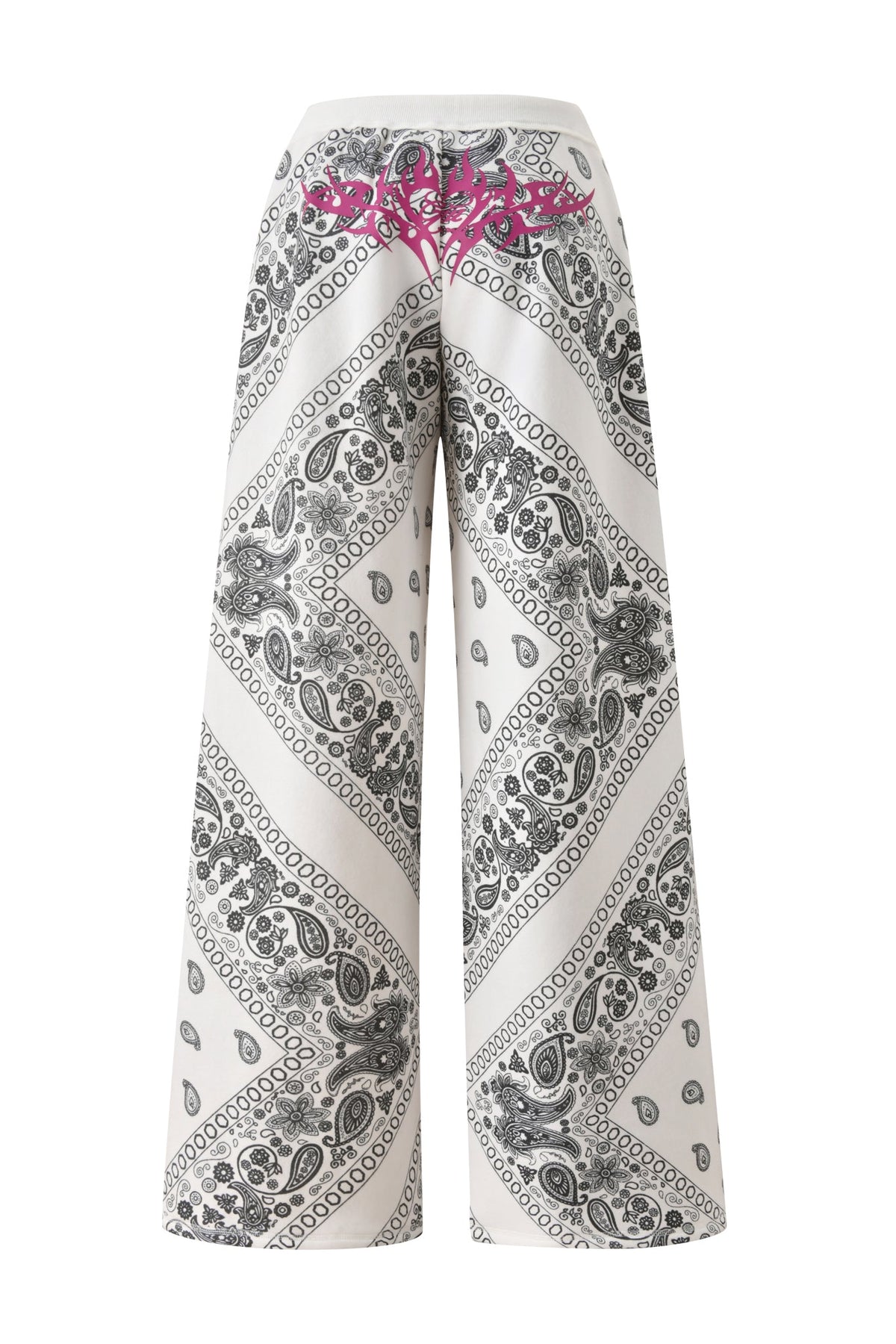 The I.AM.GIA T-REX TRACKPANT - PAISLEY features a white wide-leg fit with a black paisley print and pink graffiti-style art on the back waistband, inspired by the T-REX collaboration.