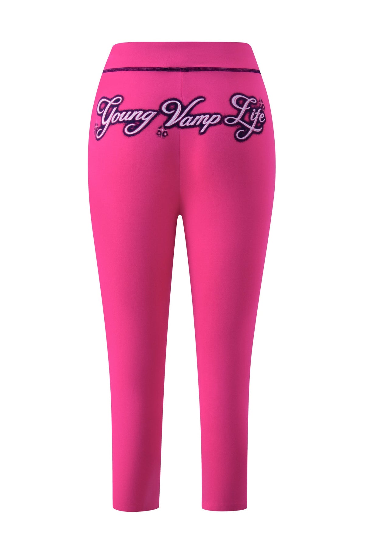 Back view of bright pink YVL BLARE CAPRI - PINK pants with the words “Young Vamp Life” embroidered in script across the waistband.