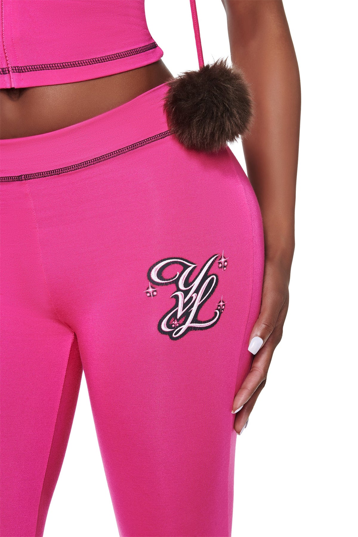 I.AM.GIA YVL BLARE CAPRI - PINK capri pants in hot pink featuring a black stitched waistband and an embroidered YVL logo on the hip.