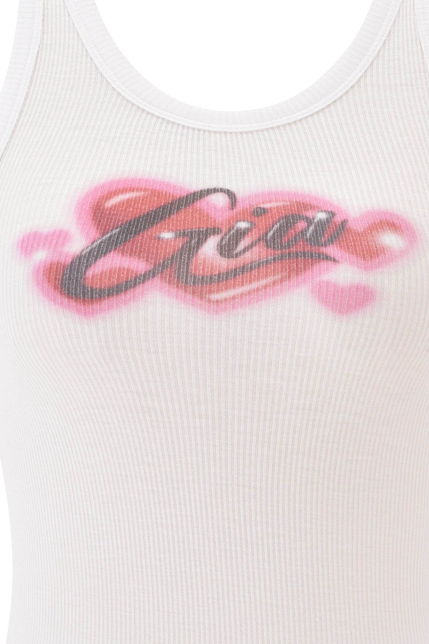 A close-up of the PENELOPE TANK - PINK AIRBRUSH by I.AM.GIA, a white rib racer tank featuring a bold black and pink graffiti-style "Gia" print across the chest.