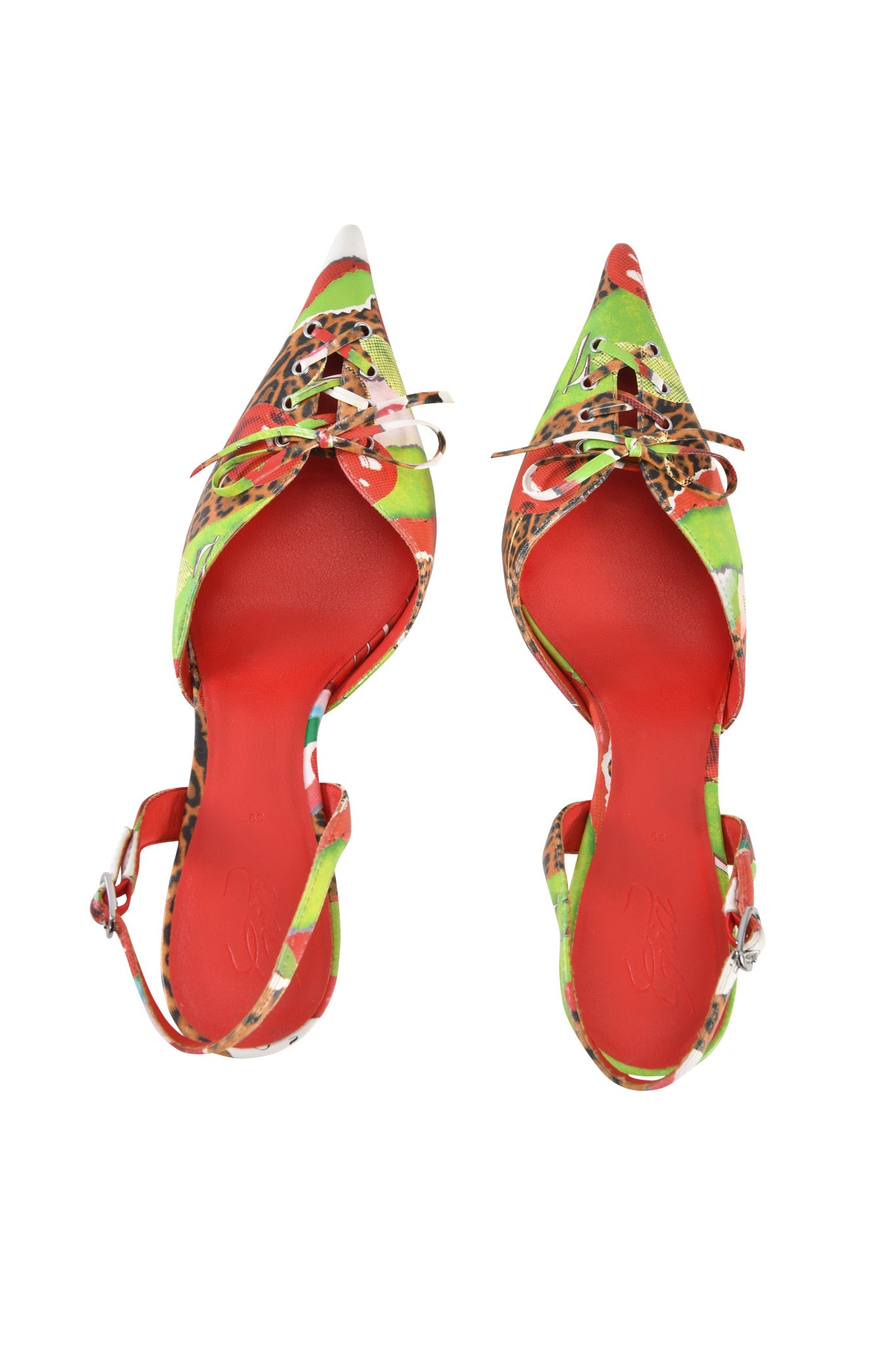 The I.AM.GIA NOORI MULE - WILD CHERRY is a pointed-toe women’s kitten heel with red soles, wild cherry and leopard print in green and red, lace-up front, and ankle straps, shown from above.