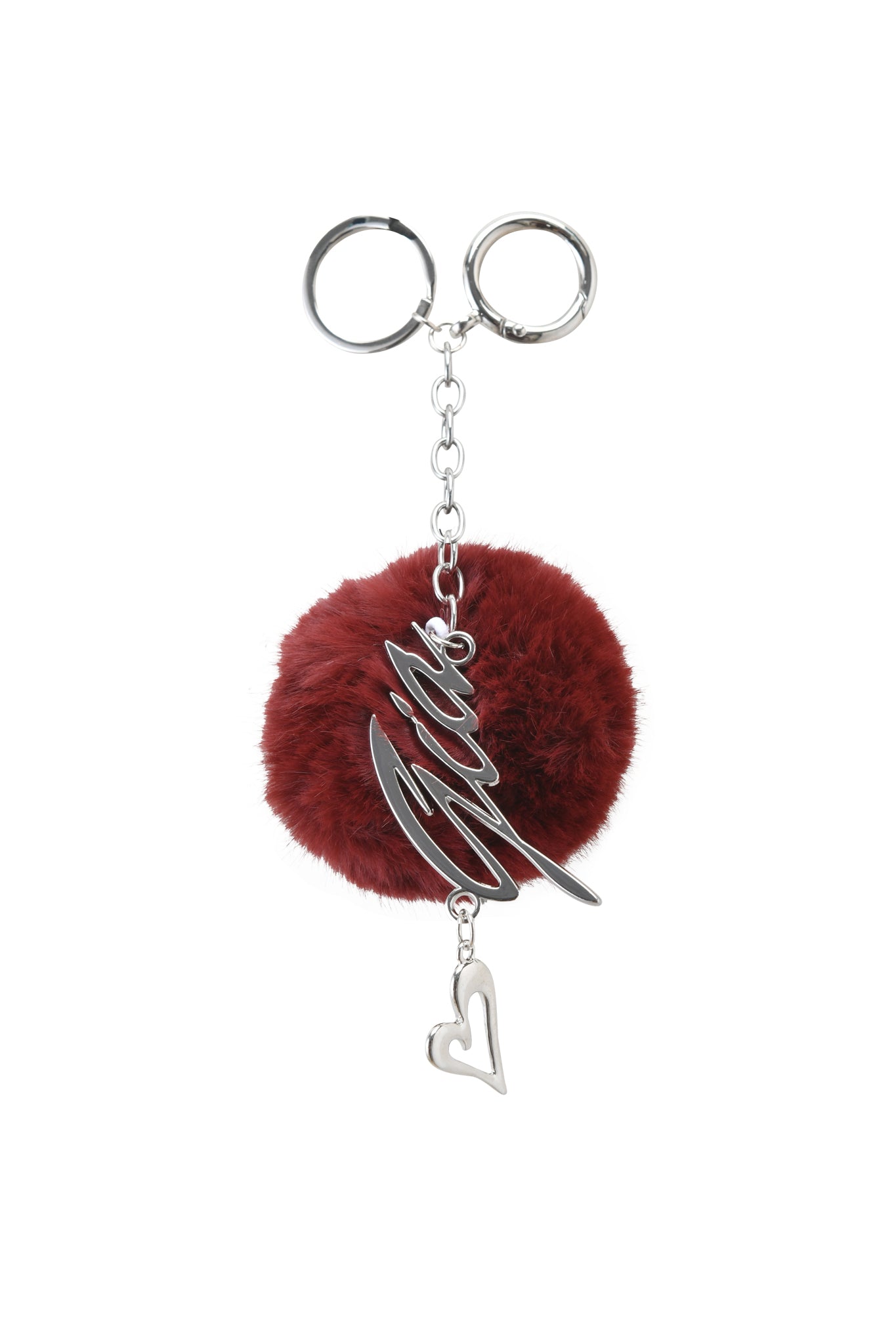 The LARSA KEYCHAIN - RED by I.AM.GIA features a deep red fluffy pom-pom, silver "Hello" and heart charms, all on durable metal hardware with the GIA logo for added style and durability.