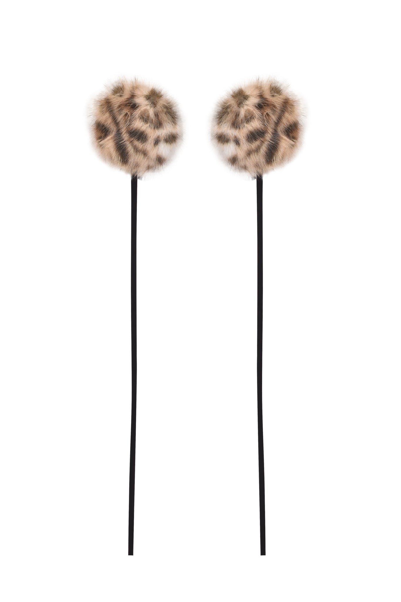 Two sleek black sticks, each topped with an I.AM.GIA FAWN HEADPHONE COVER in leopard print faux fur, displayed against a white background.