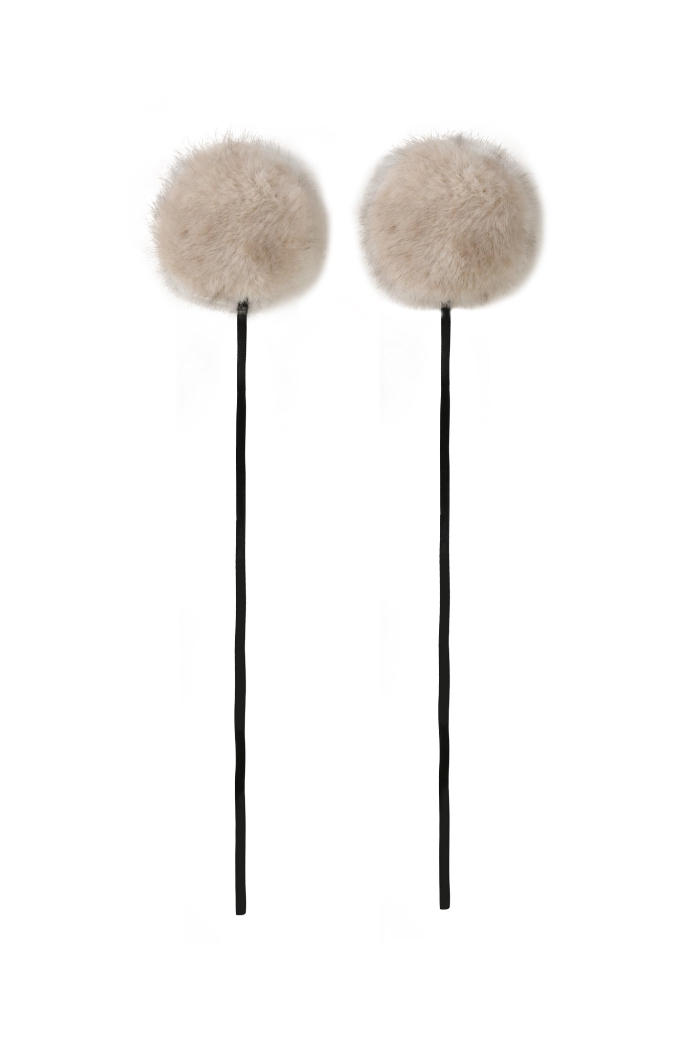 Two fluffy, round, light beige FAWN HEADPHONE COVERS in taupe by I.AM.GIA are shown attached to headphones against a plain white background.
