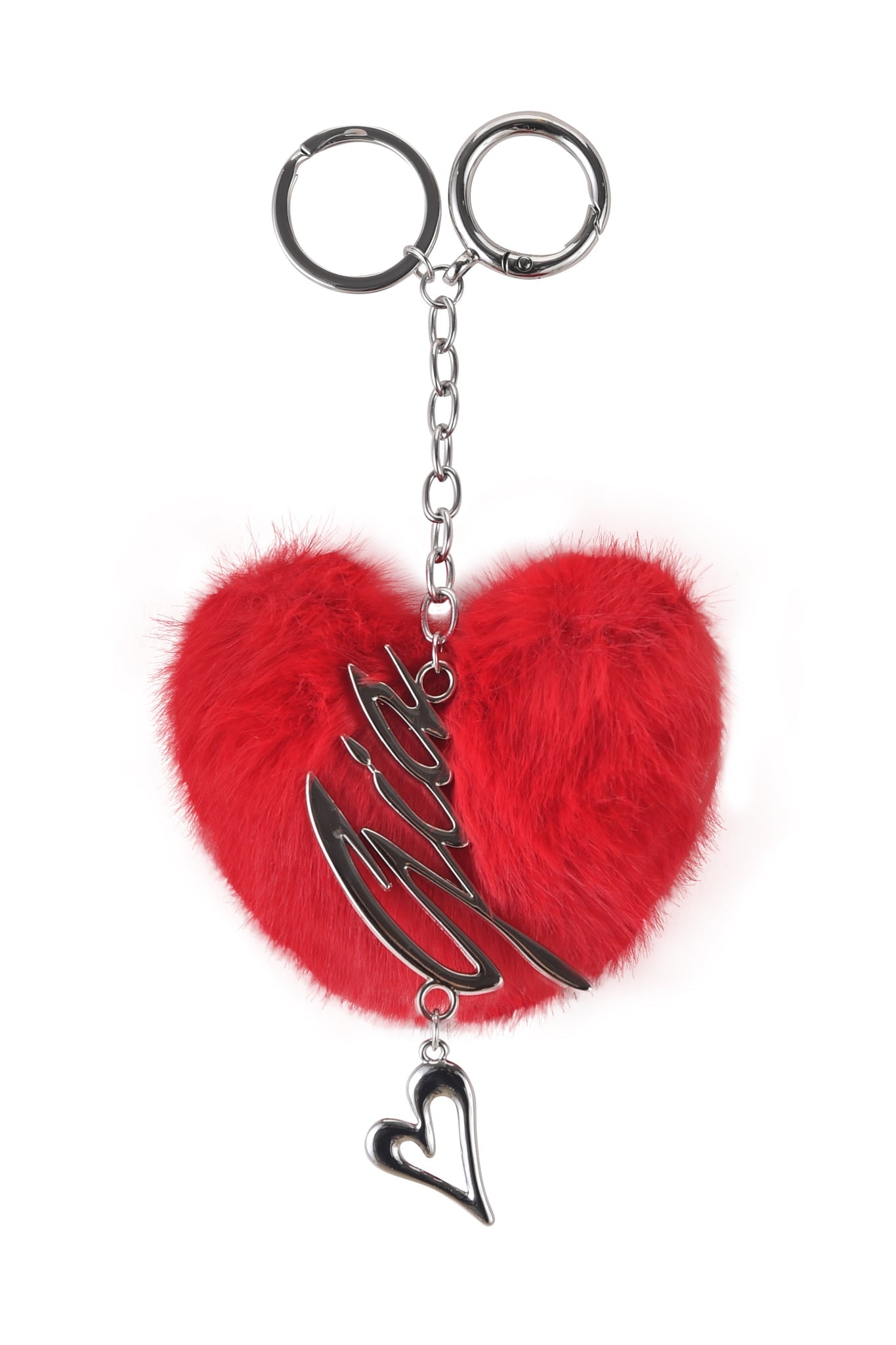 The VALENTINA KEYCHAIN by I.AM.GIA is a heart-shaped accessory with red faux fur, metal chain, two key rings, a metal script word, and a small heart charm for added elegance.