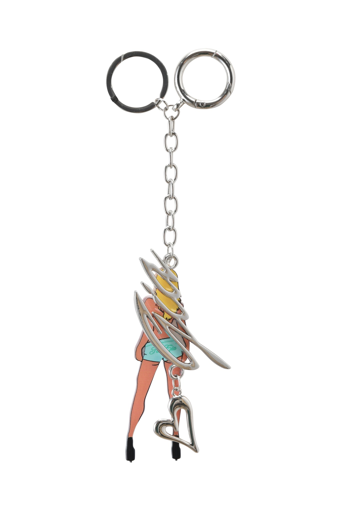 The BLARE KEYCHAIN - BLONDE by I.AM.GIA features a stylized illustration of a woman’s legs in high heels, a turquoise skirt, metal swirl detailing, and a dangling silver GIA logo charm.