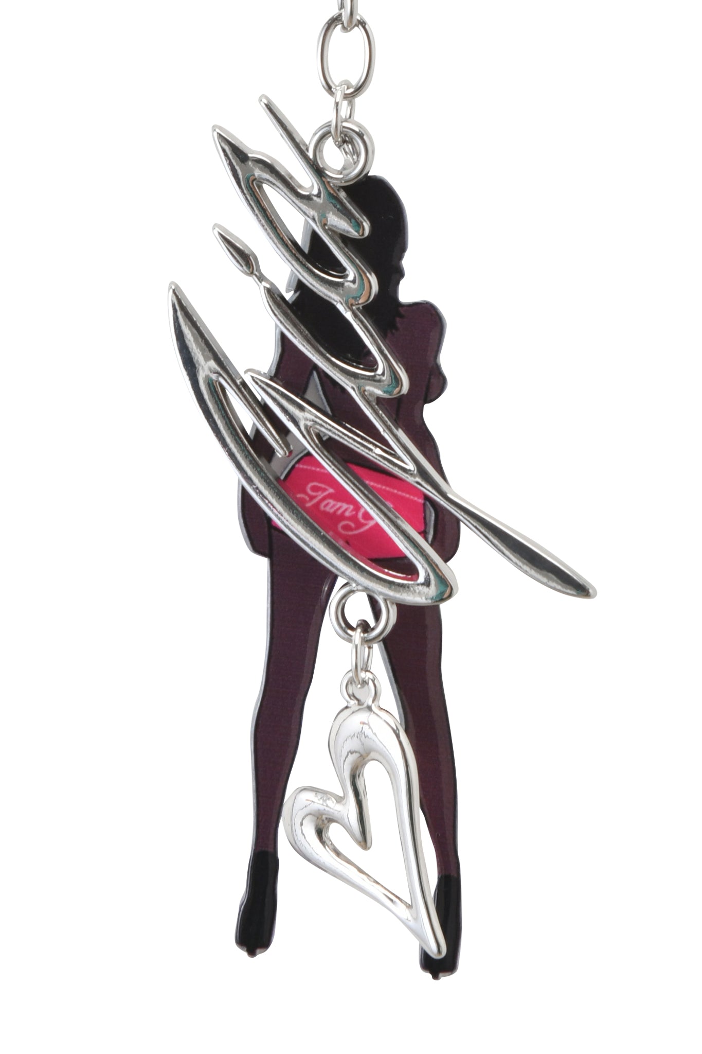 The I.AM.GIA BLARE KEYCHAIN - BRUNETTE features a brunette girl in high heels with metallic abstract shapes and a custom silver heart charm, all on a white background.