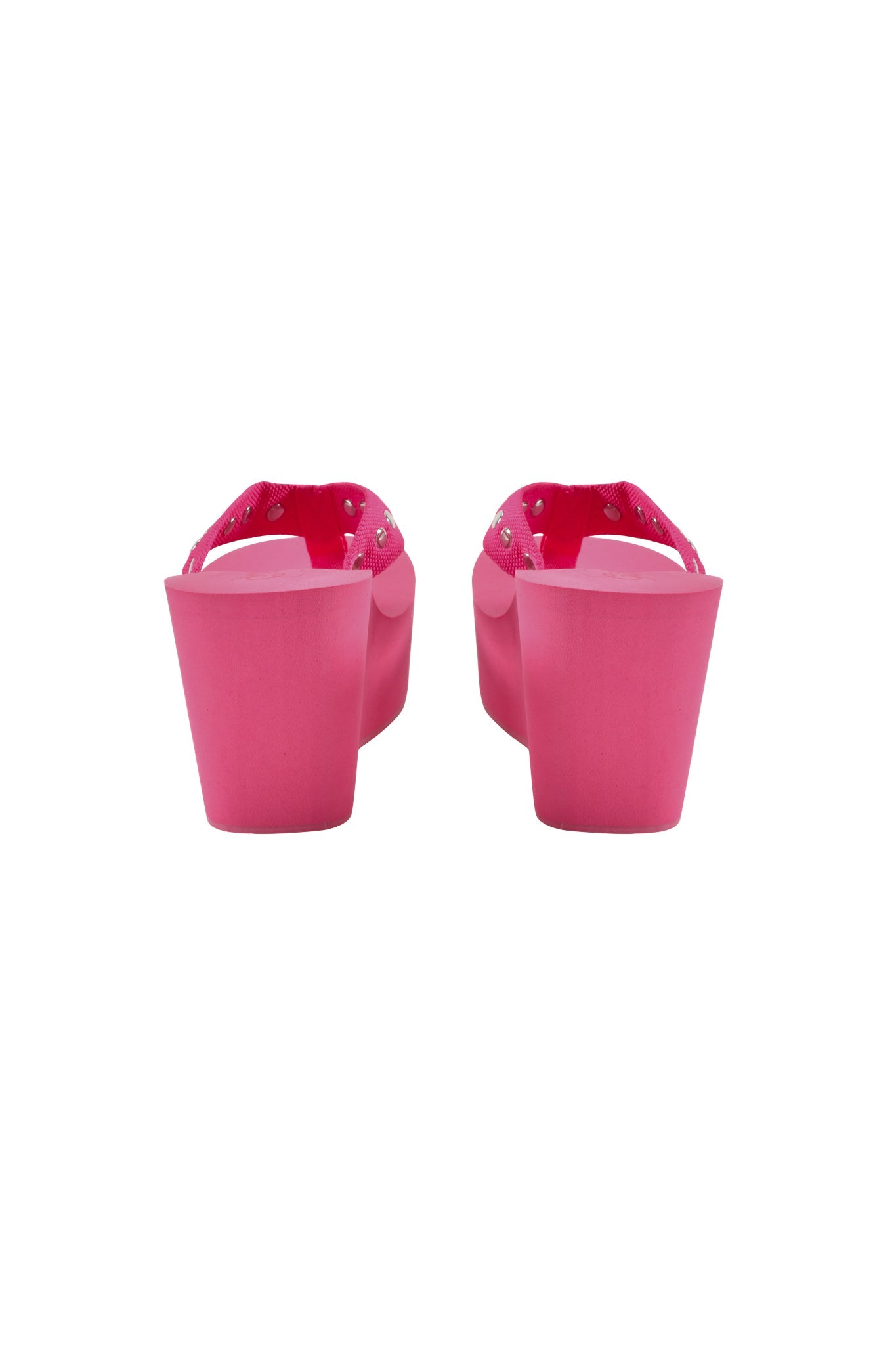 The I.AM.GIA SHELBY STUDDED FLIP FLOP 2.0 in hot pink features striking platform wedge heels and studded straps, shown from the back on a white background—ideal for fans of bold flip flop or classic wedge sandal styles.