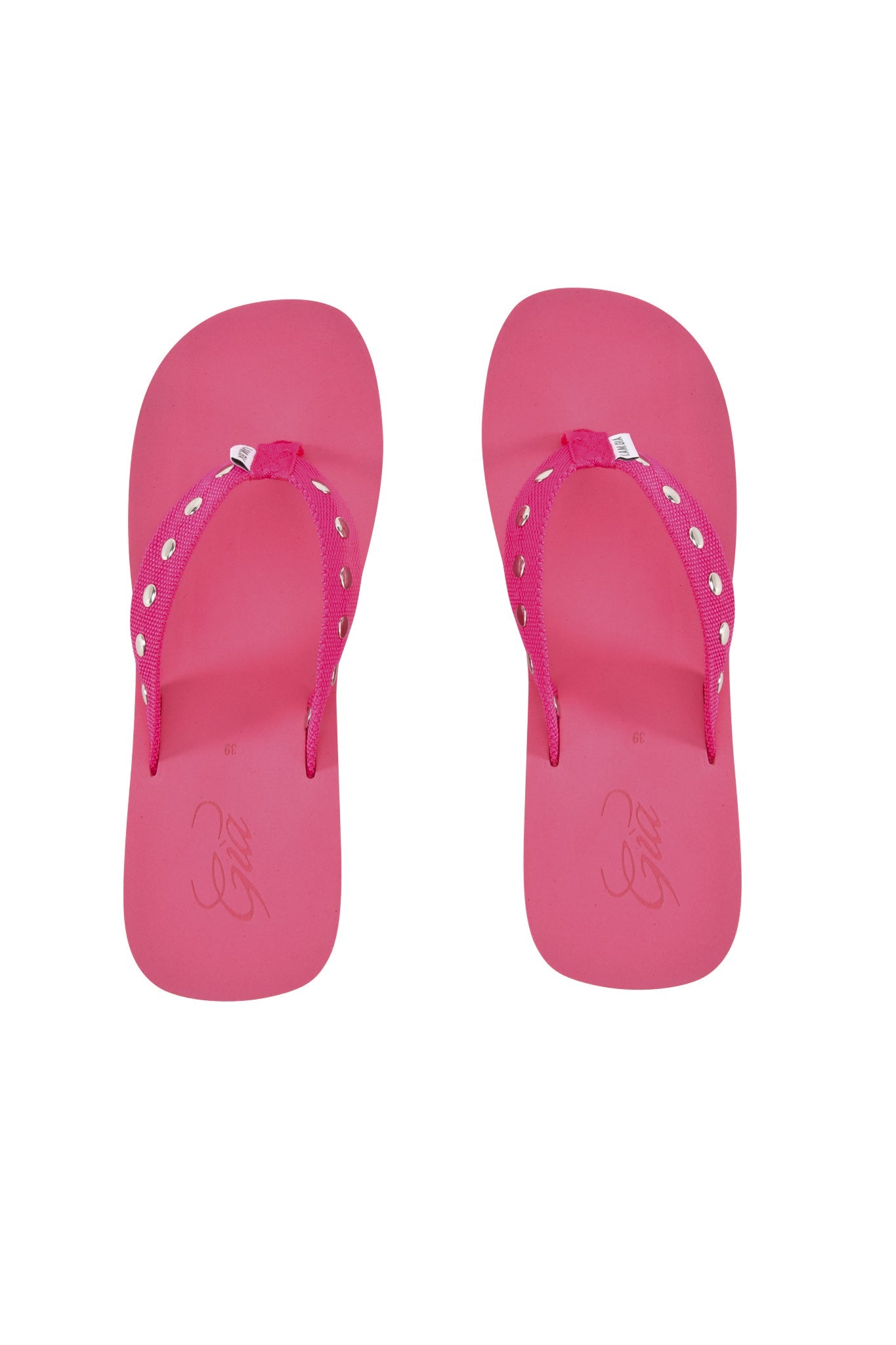 The I.AM.GIA SHELBY STUDDED FLIP FLOP 2.0 in hot pink features silver-studded straps, shown side by side on a white background.