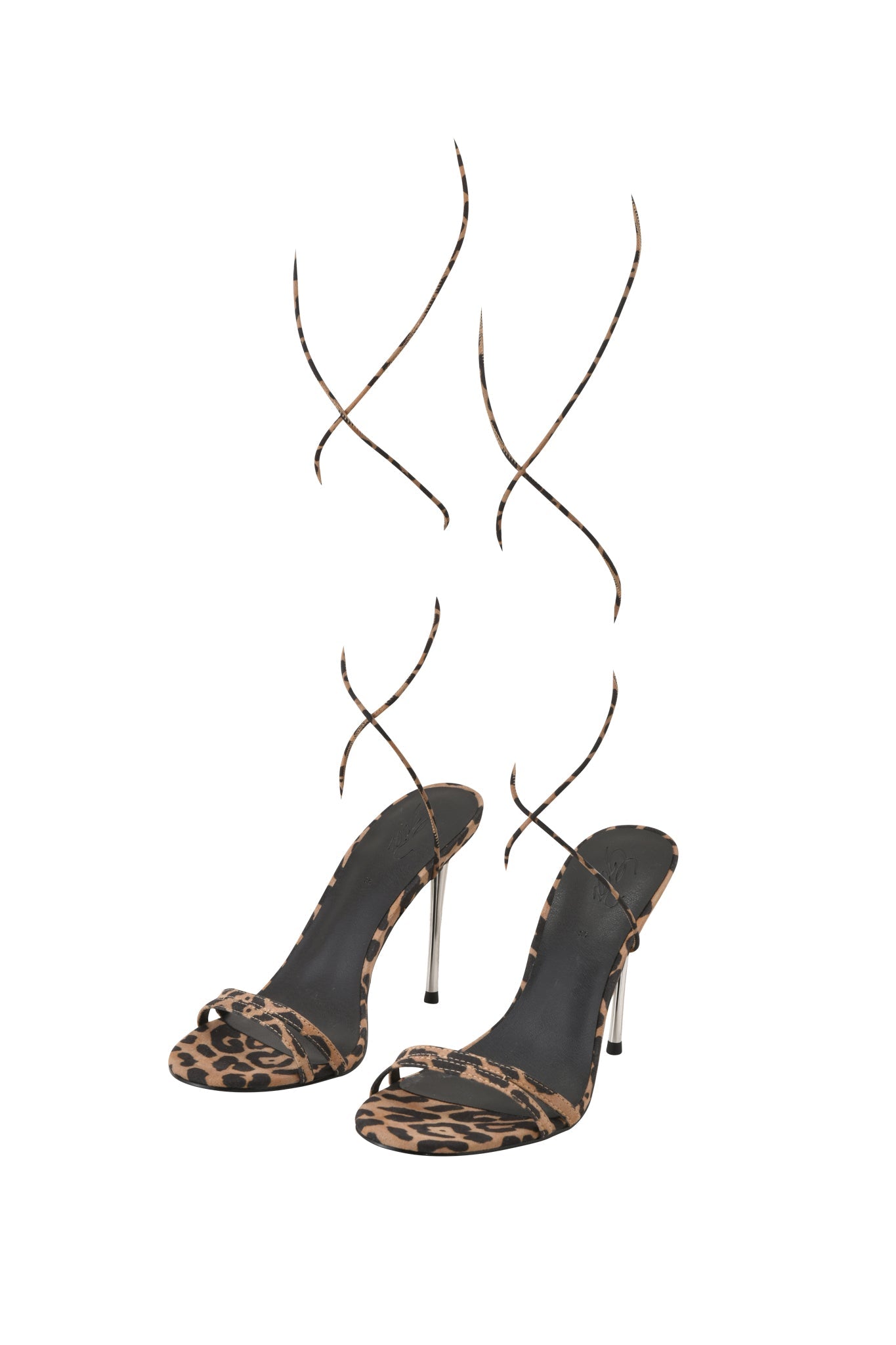 The I.AM.GIA SCARLETTE HEEL - LEOPARD features a bold leopard print, open toe, and long, thin ankle straps that spiral upward for a striking high-fashion look.