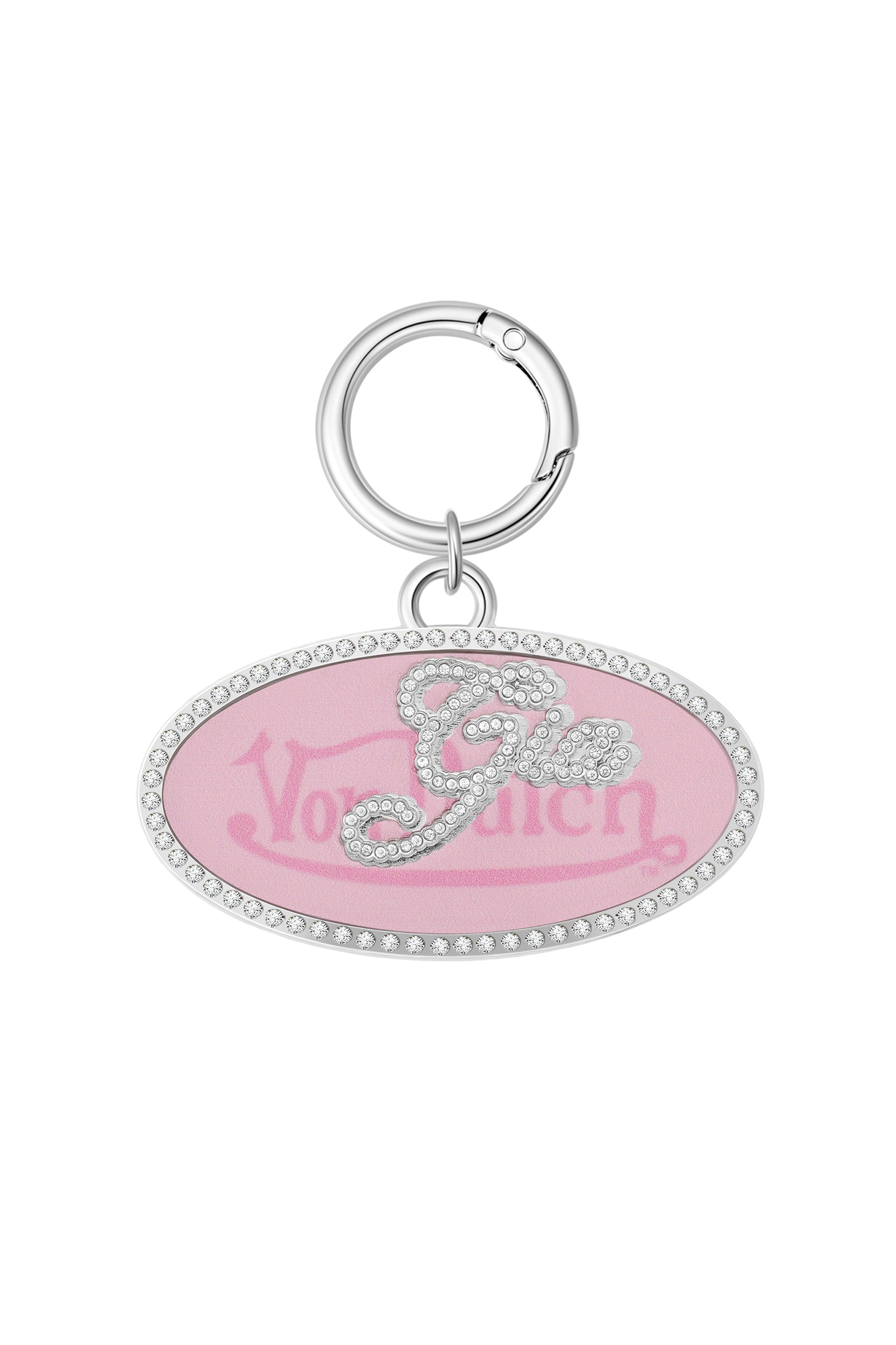 The I.AM.GIA X VON DUTCH OVAL KEYCHAIN - GIA GIRL CAMO PINK OVAL features a sparkling "G" on a camo pink background with rhinestone edges and a subtle Von Dutch logo—an iconic accessory for fans of I.AM.GIA.