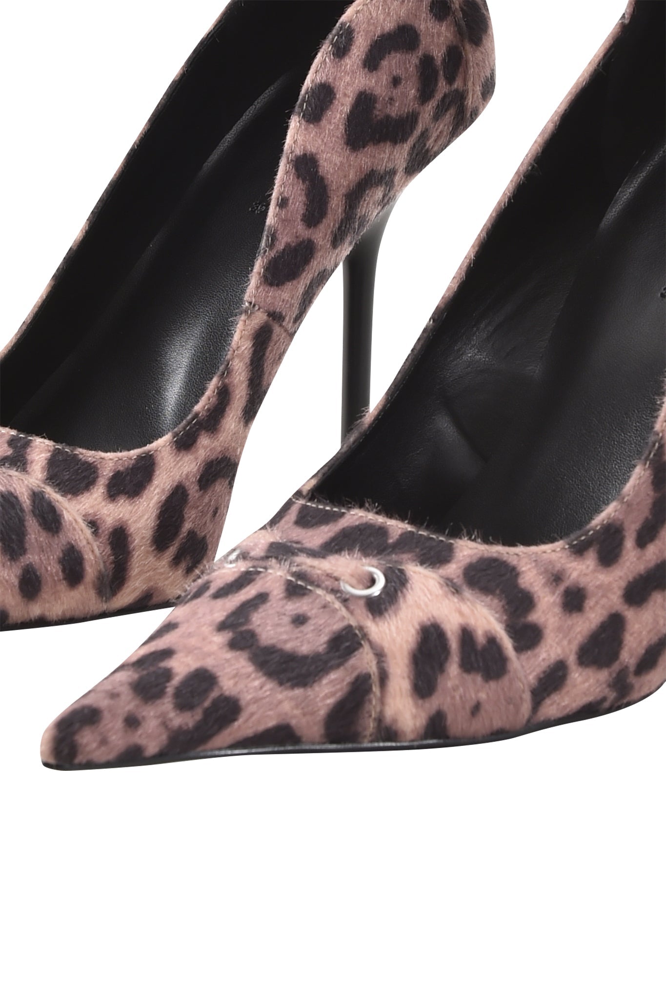 Close-up of the I.AM.GIA ANASTASIA PUMP - LEOPARD, featuring pointed toes, thin stiletto heels, and a bold pink and black faux fur cheetah print, set against a white background.