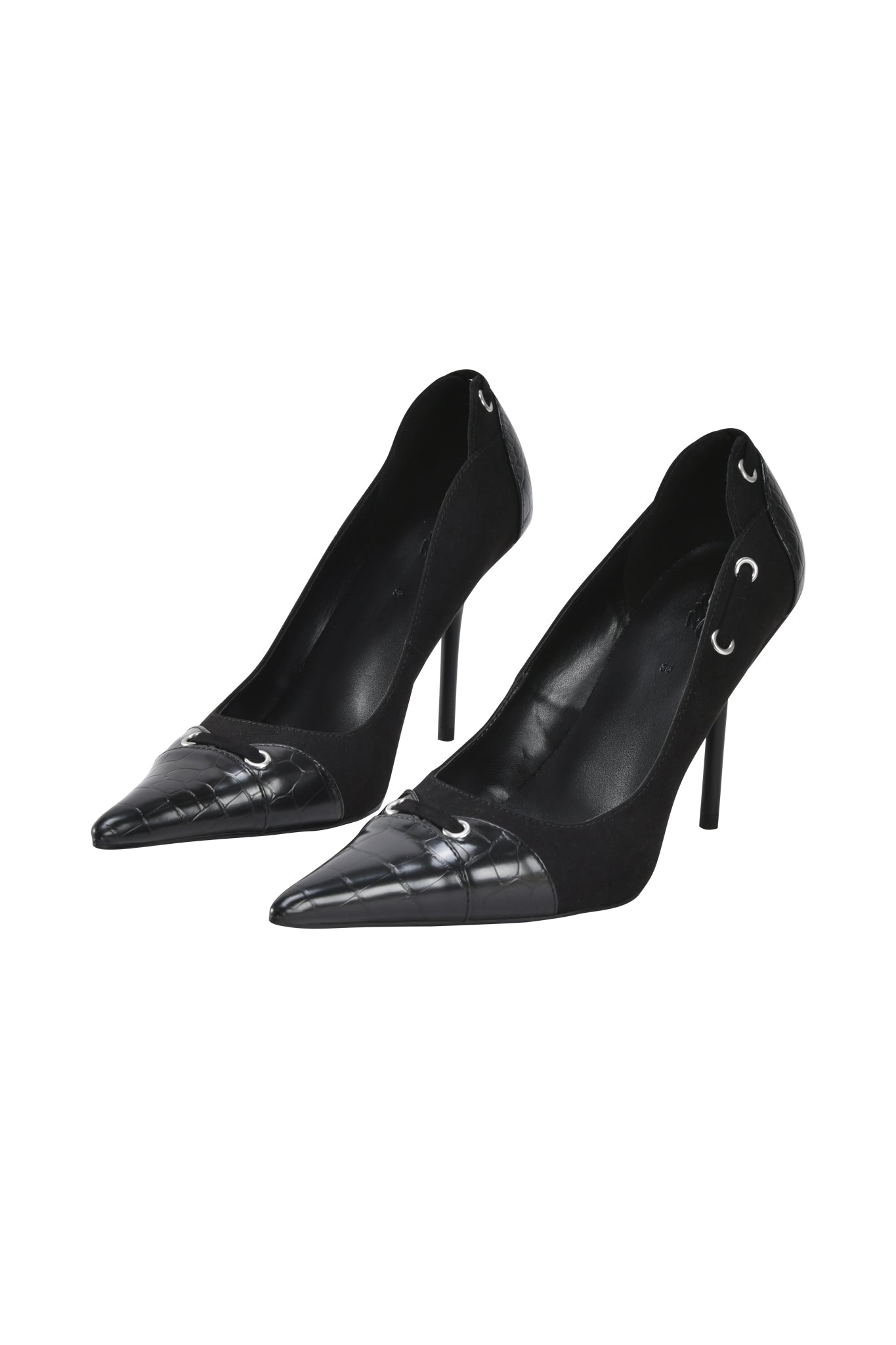 The ANASTASIA PUMP - BLACK CROC by I.AM.GIA features black faux crocodile skin, pointed toes, lace and grommet detailing on the sides, braiding accents, and a shiny toe cap, shown against a white background.