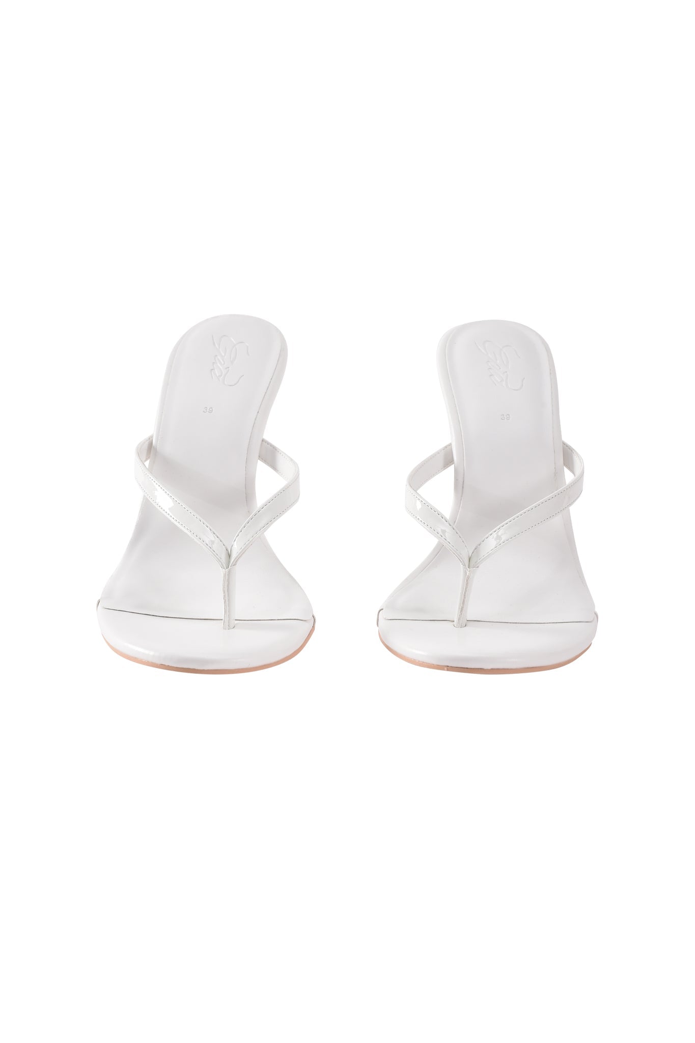 The VIKTORIA WEDGE HEEL in white by I.AM.GIA features slim straps, open toes, and a minimalist faux leather design, shown against a plain white background.