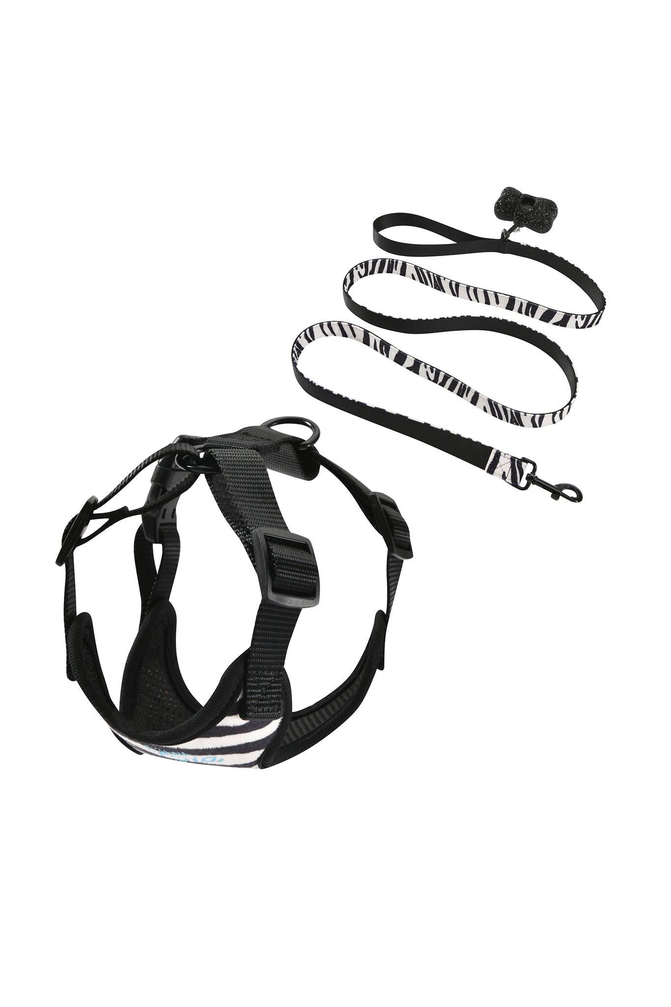 The STAR PAWFECT 3-PIECE SET - FINE LINE ZEBRA by I.AM.GIA is displayed on a white background, featuring a black and white zebra-striped pet harness, matching leash, and accessories with a sleek black clip and handle for a stylish look that’s perfect for your furry friend.