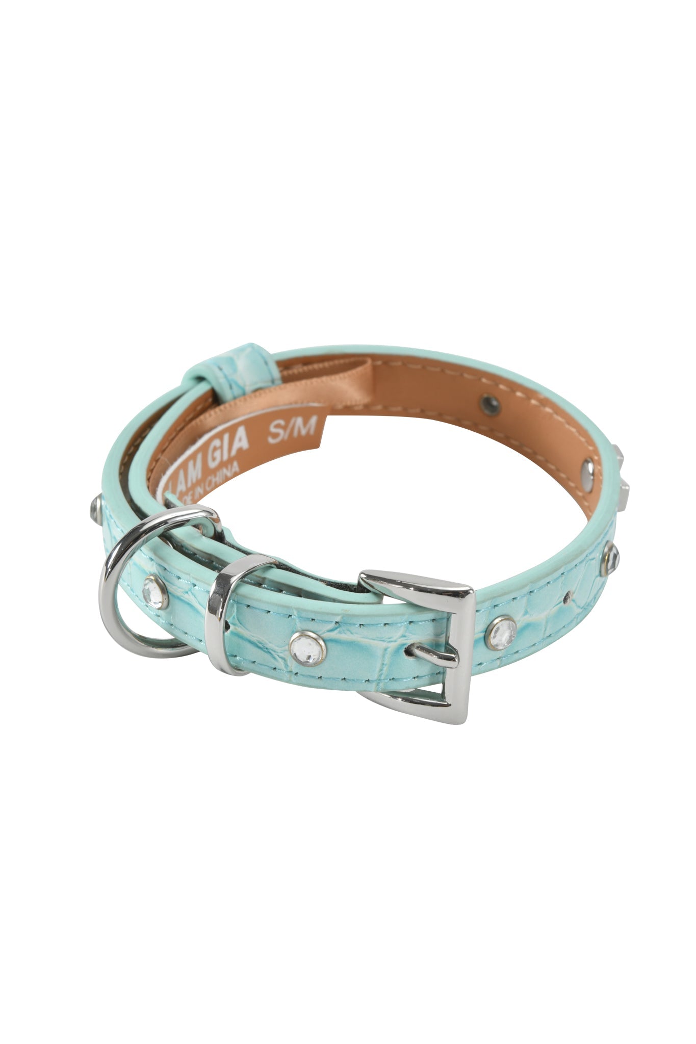 The STAR PET COLLAR - BABY BLUE by I.AM.GIA is a baby blue faux leather dog collar with silver studs, metal buckle, D-ring, and a tan inner side, shown against a white background.