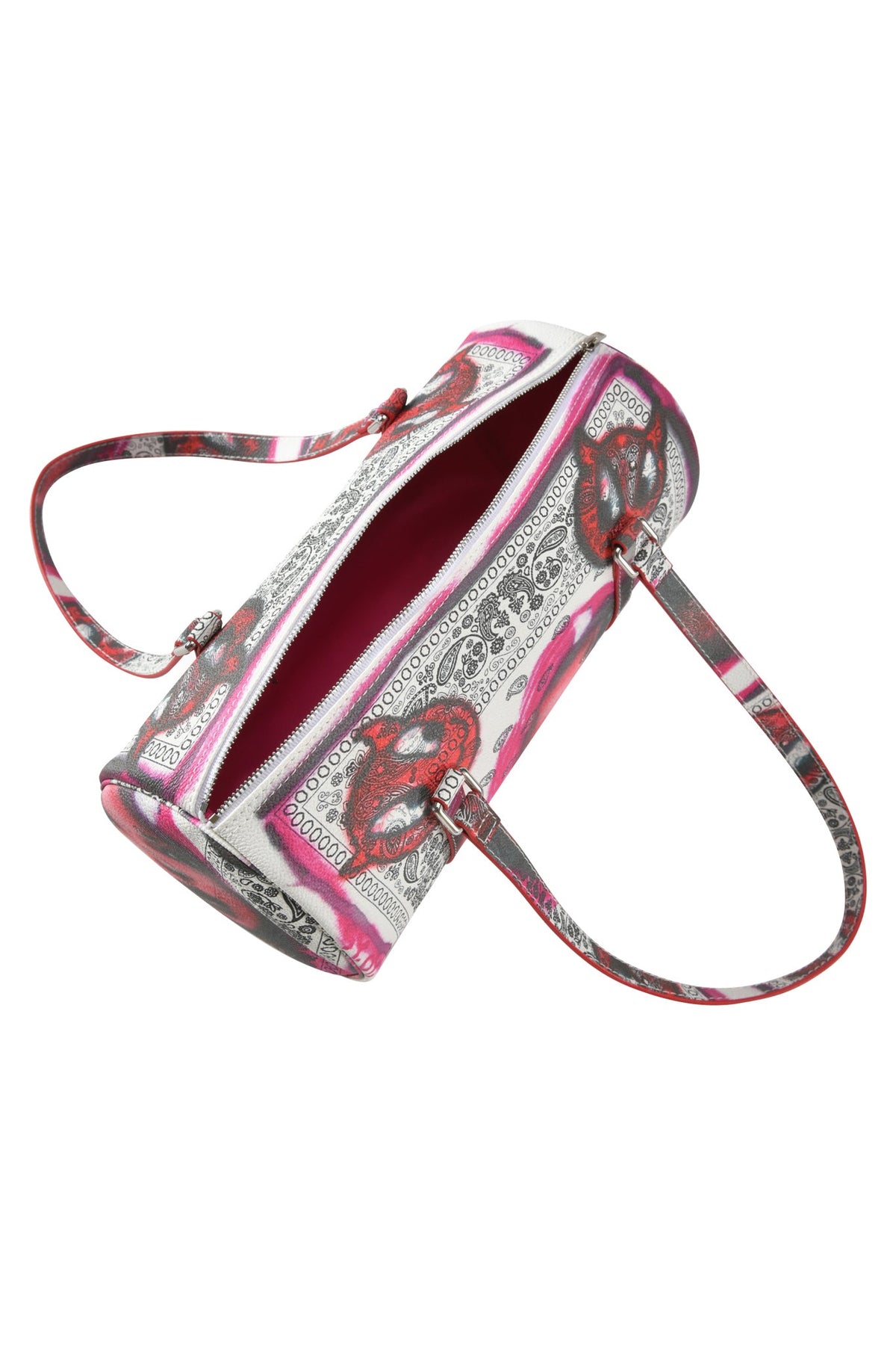 The T-REX BARREL BAG - PAISLEY FACE by I.AM.GIA features a pink, red, black, and white paisley pattern, two handles, faux leather trim, top zipper closure, and a vibrant pink interior.
