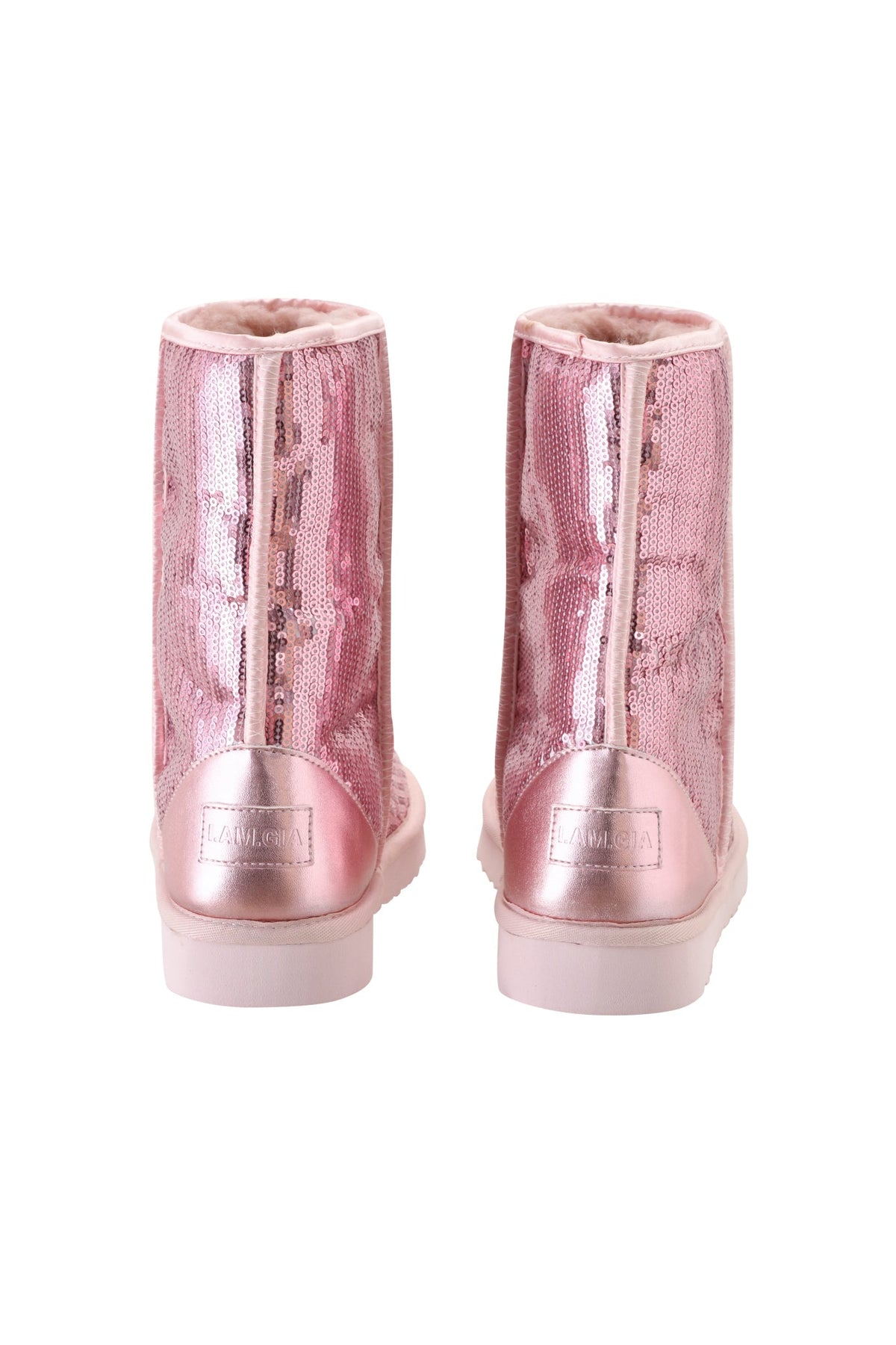 The I.AM.GIA ELVIRA SEQUIN BOOT in pink, featuring a soft plush faux fur lining, is shown from the back against a white background.