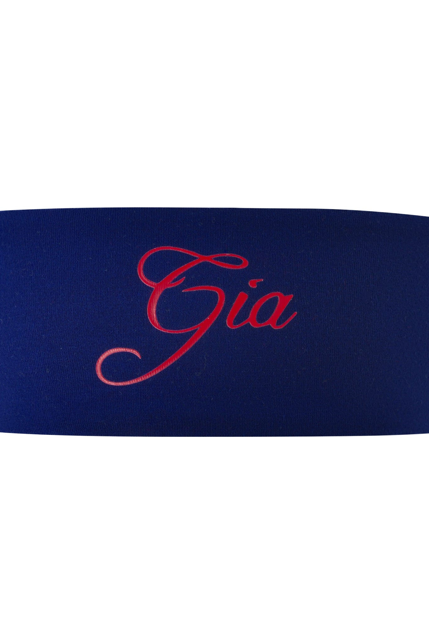 The BLARE SPORT HEADBAND - NAVY by I.AM.GIA features elegant red "Gia" script and a soccer-inspired design, showcasing the brand’s bold aesthetic.
