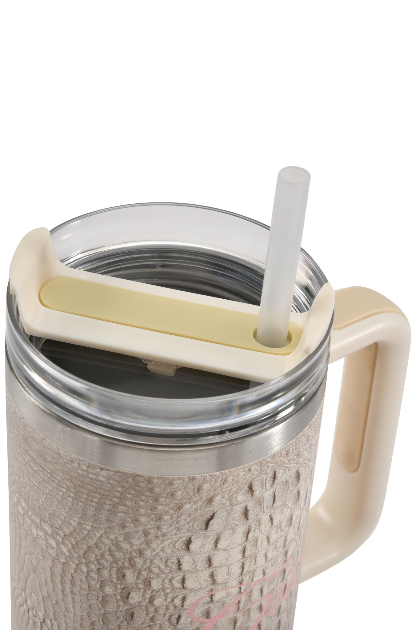 Introducing the BLARE CUP - HOT CROC by I.AM.GIA: a 40oz travel mug featuring a subtly textured, light beige exterior inspired by crocodile print. This insulated stainless steel tumbler comes with a clear lid, a cream-colored handle and matching cream slider, plus a reusable straw that fits perfectly through the lid opening.