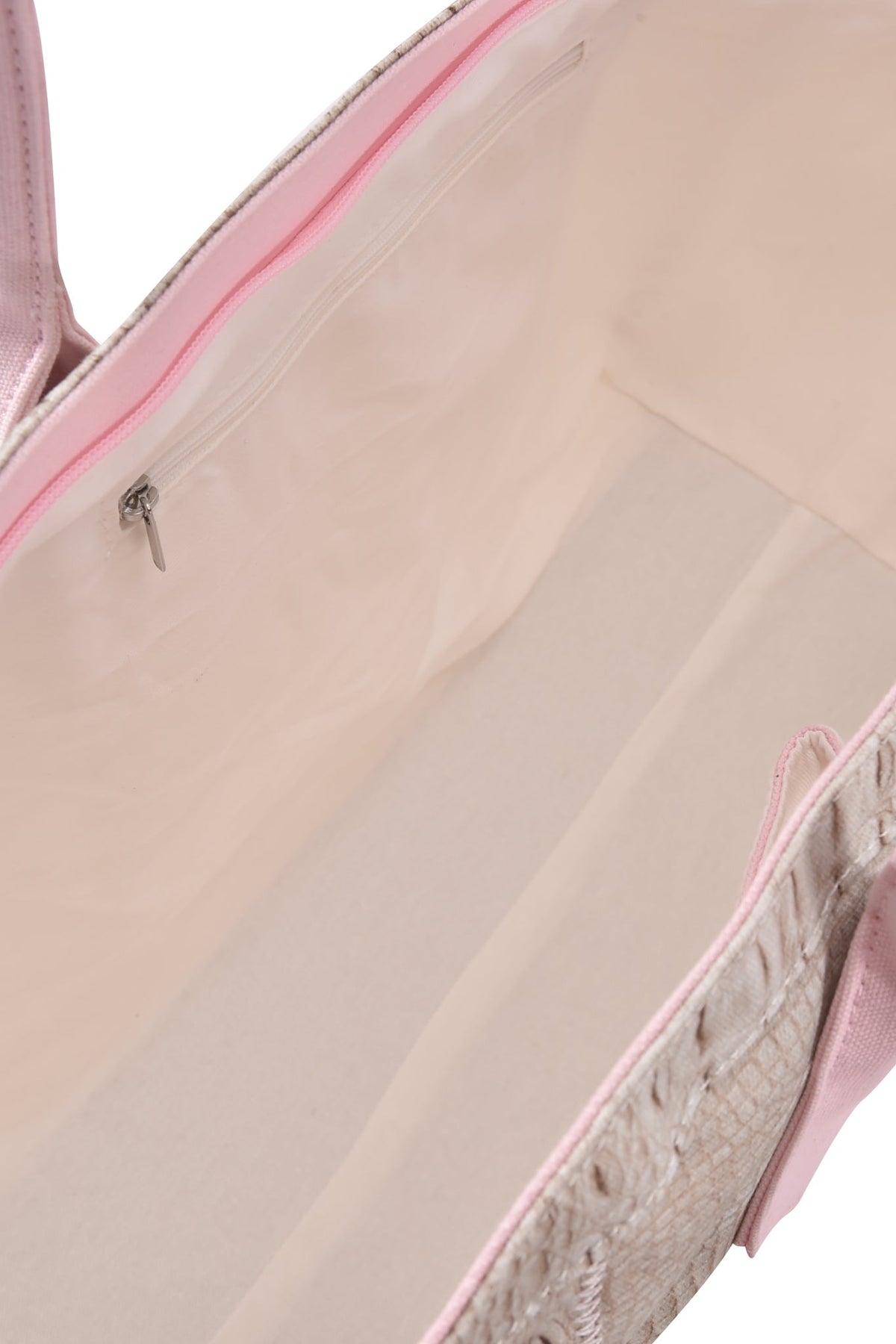 Open view of the I.AM.GIA BLARE TOTE BAG - HOT CROC, featuring a light pink textured crocodile print exterior, and revealing a spacious cream interior with a zippered pocket on the inside wall.