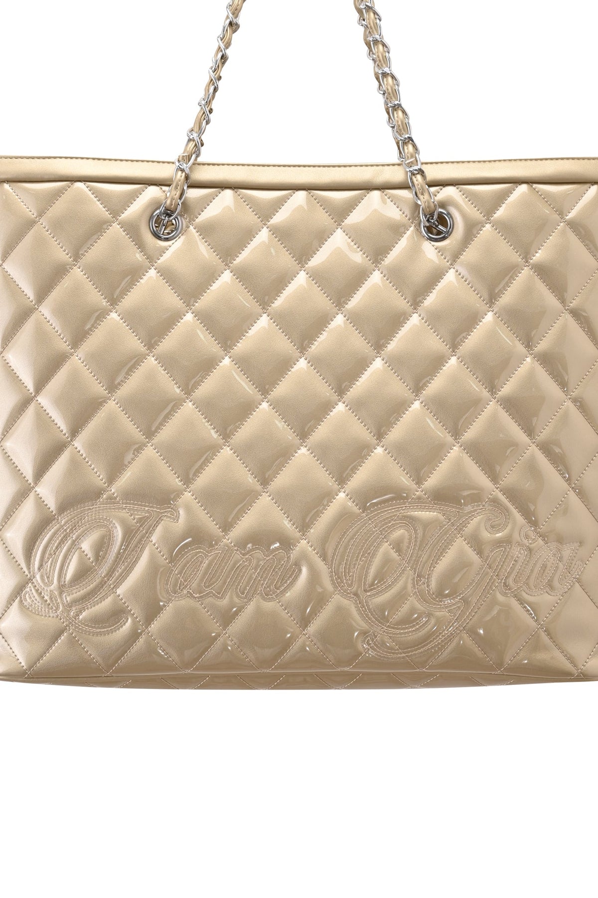 Close-up of the DANNI TOTE BAG - GOLD by I.AM.GIA, featuring a beige quilted design with chain link straps and subtle stitched “I.AM.GIA” text along the lower front panel.
