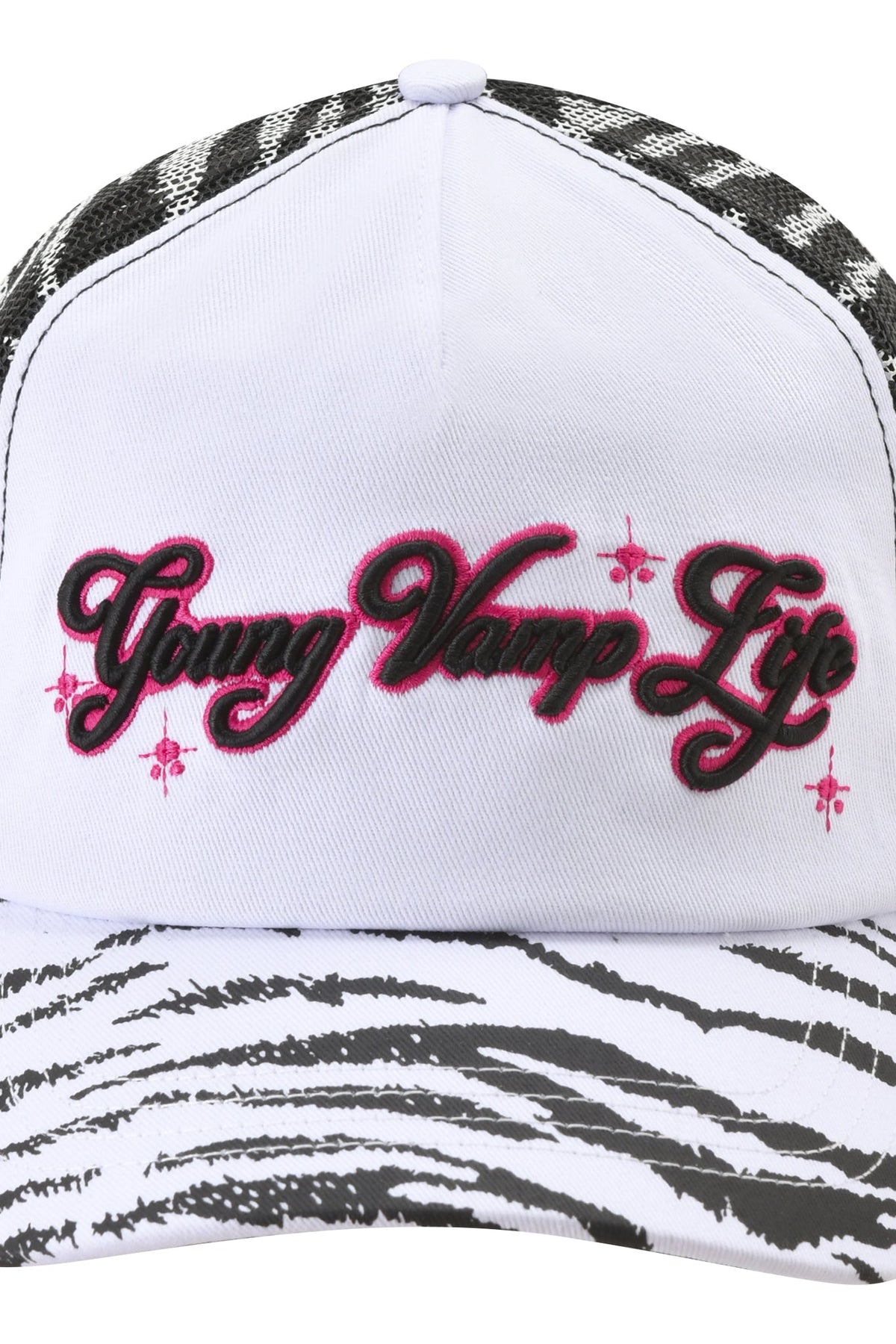 YVL TRUCKER HAT - ZEBRA featuring a white front with embroidered pink and black “Young Vamp Life” text, a black zebra-print brim, and a mesh back.