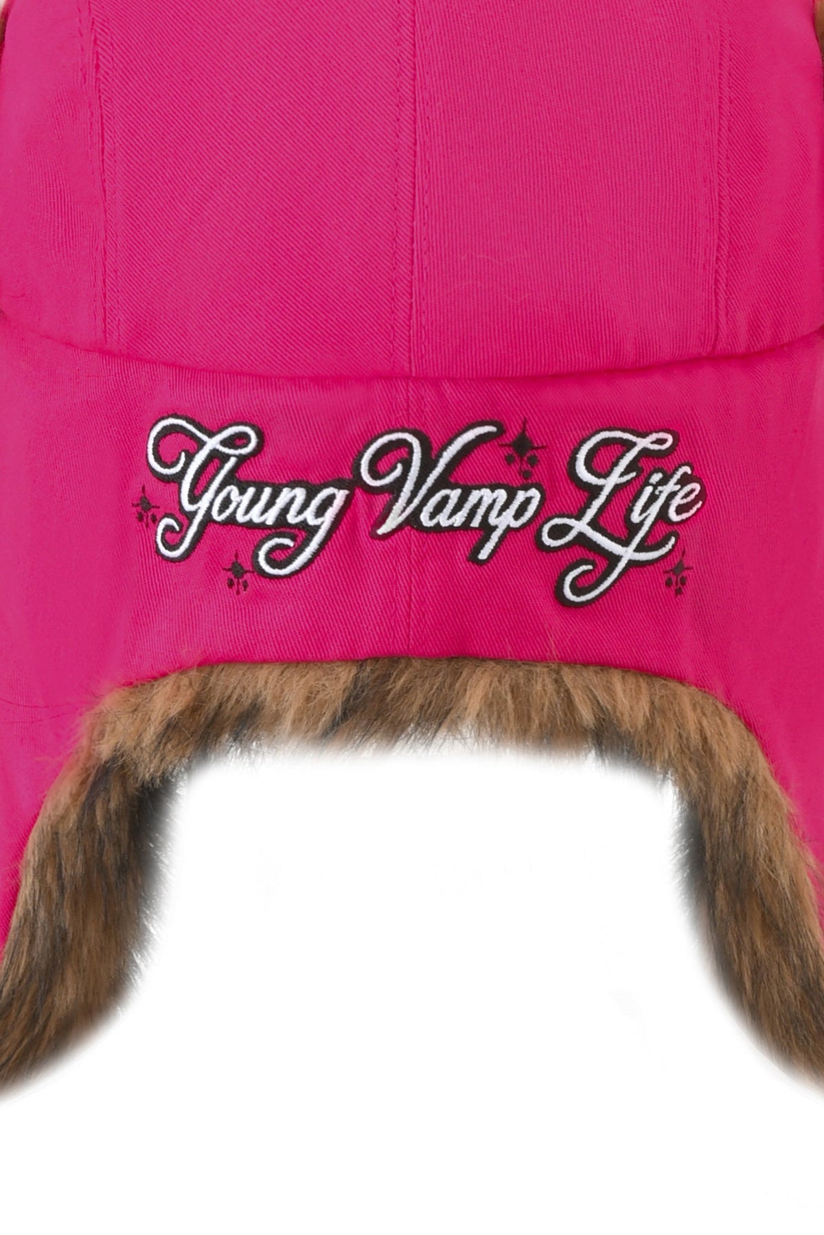 I.AM.GIA YVL FUR TRAPPER HAT - PINK featuring bright hot pink faux fur and the embroidered text “Young Vamp Life” in white script.
