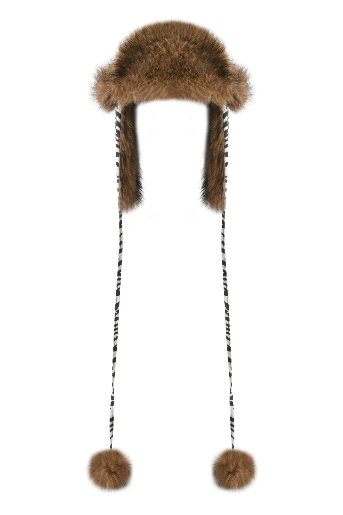 I.AM.GIA YVL FUR TRAPPER HAT - ZEBRA in brown faux fur with long, dangling black and white zebra canvas ties ending in faux fur pom-poms.