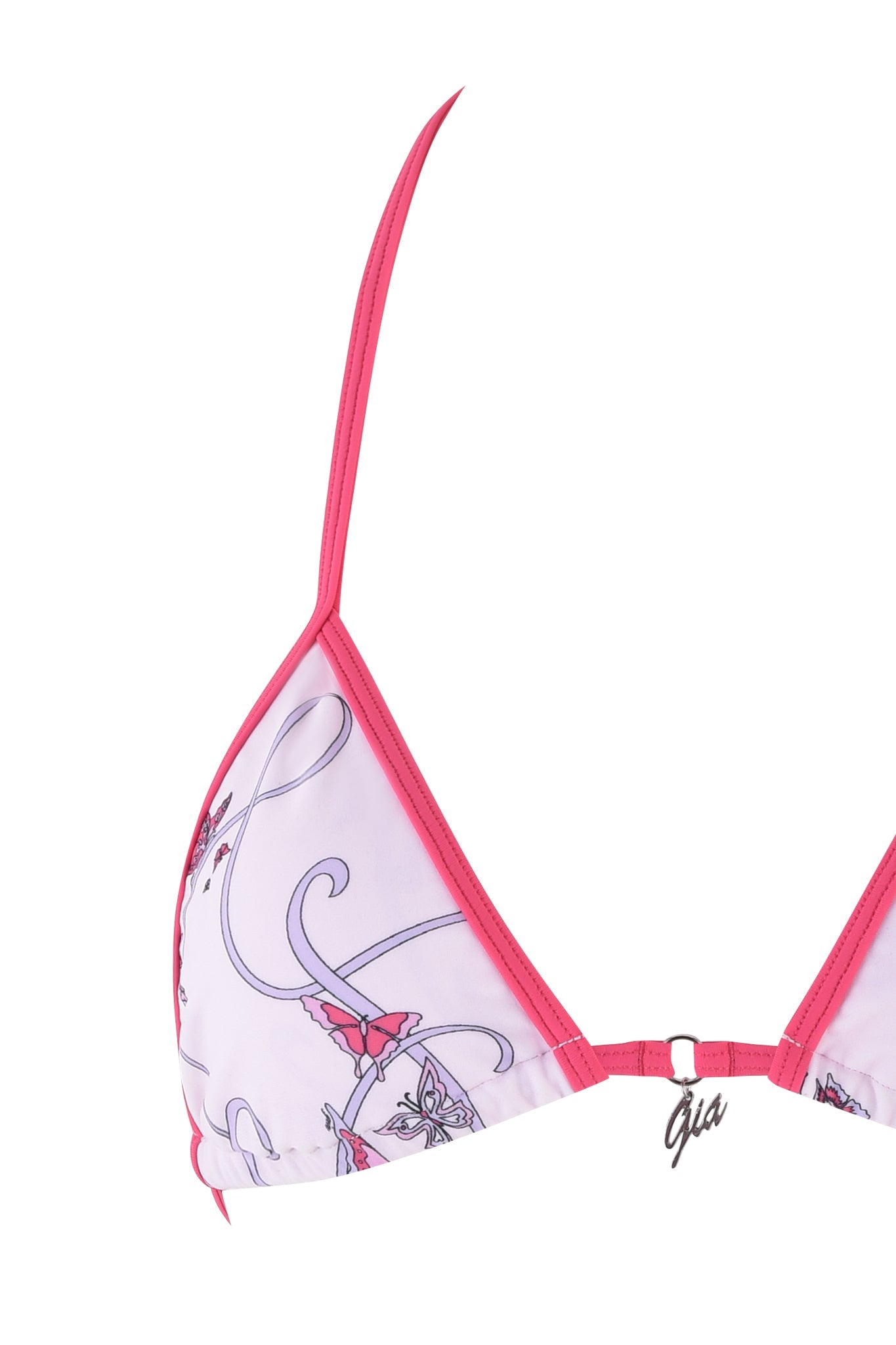 Close-up of the CORDELIA 2.0 BIKINI TOP - PINK: BUTTERFLY RIBBON by I.AM.GIA, featuring a triangle design with pink trim and abstract patterns on white. A metal charm reading "Gia" adorns the strap, enhancing its artistic flair against a plain background.