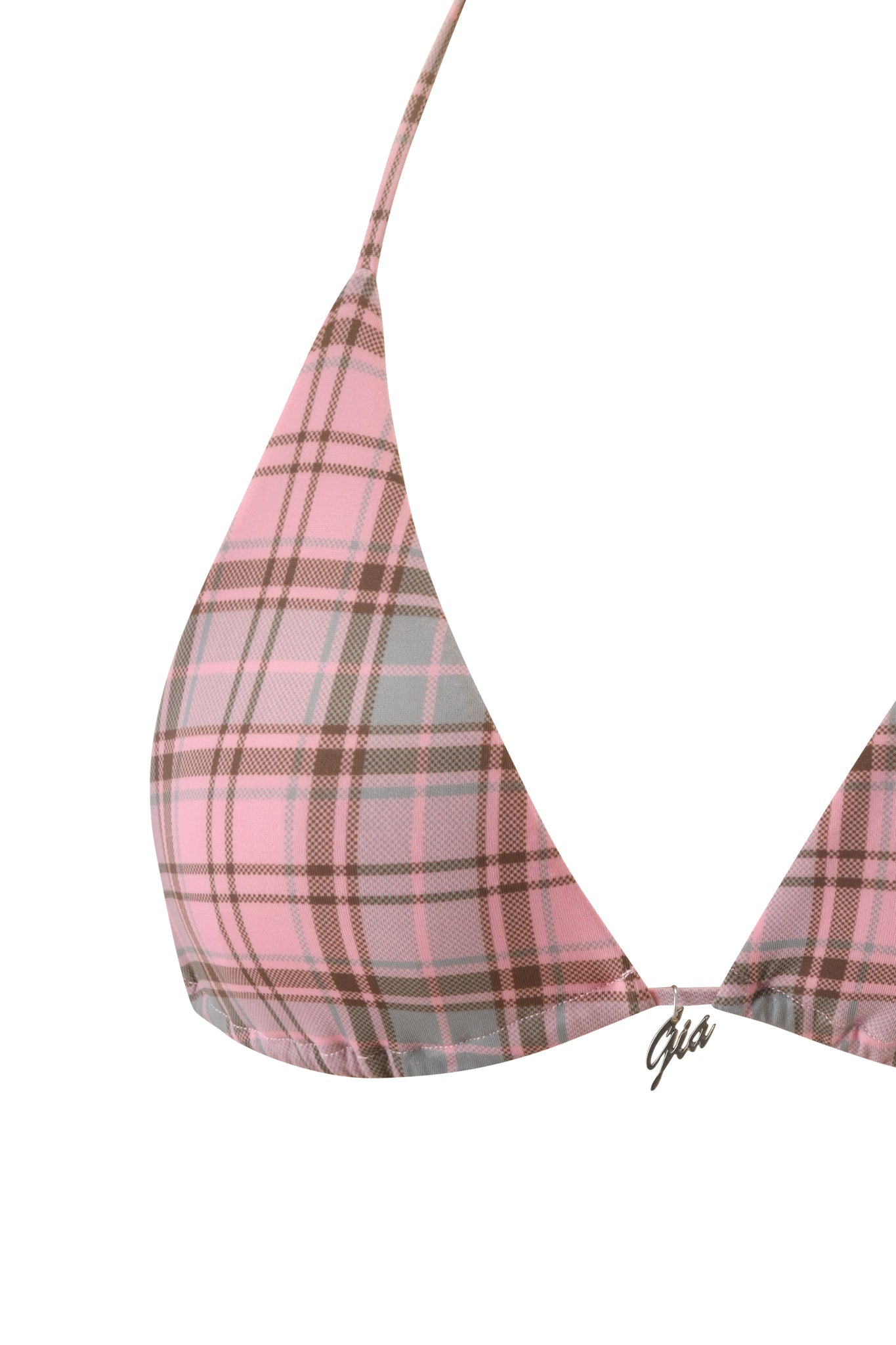 Close-up of the I.AM.GIA BRITT BIKINI TOP in pink plaid, featuring thin straps and a small metallic charm with cursive writing at the center of the lower edge.