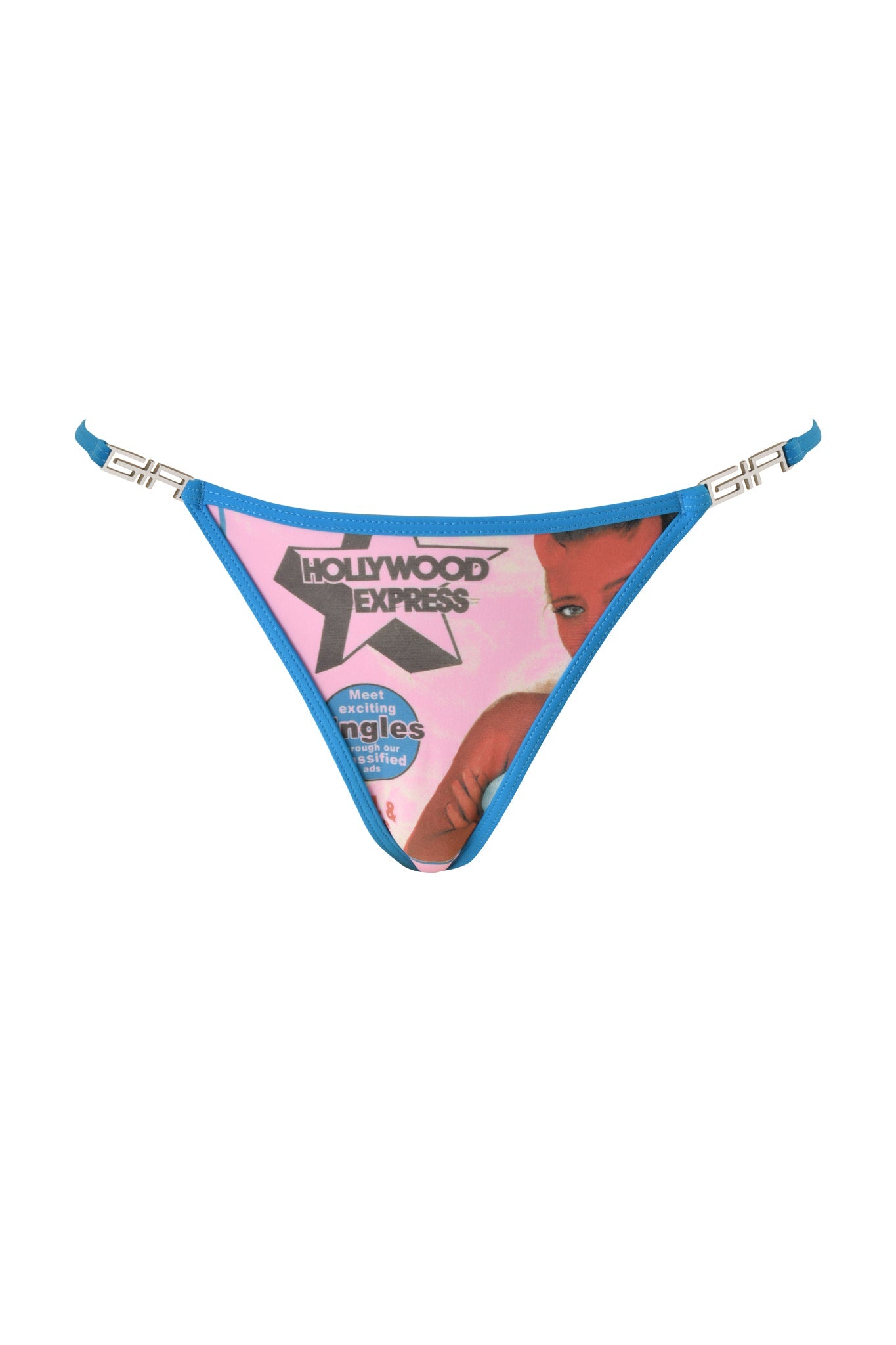 The T-REX AVA BIKINI BOTTOM - PINK by I.AM.GIA features blue trim, a vintage-style print of a woman on a baby pink background, and text reading “Hollywood Express” along with additional small text details—making it a unique piece in the Ava Bikini collection.