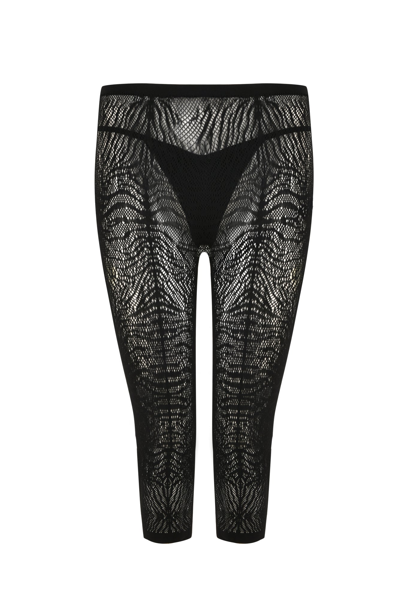 The SYBIL CAPRI - BLACK: ZEBRA biker shorts by I.AM.GIA showcase an intricate floral patterned lace, creating a bodycon silhouette. The transparent lace material reveals a black inner lining at the top for coverage, while the lace elegantly extends to just below the knee.