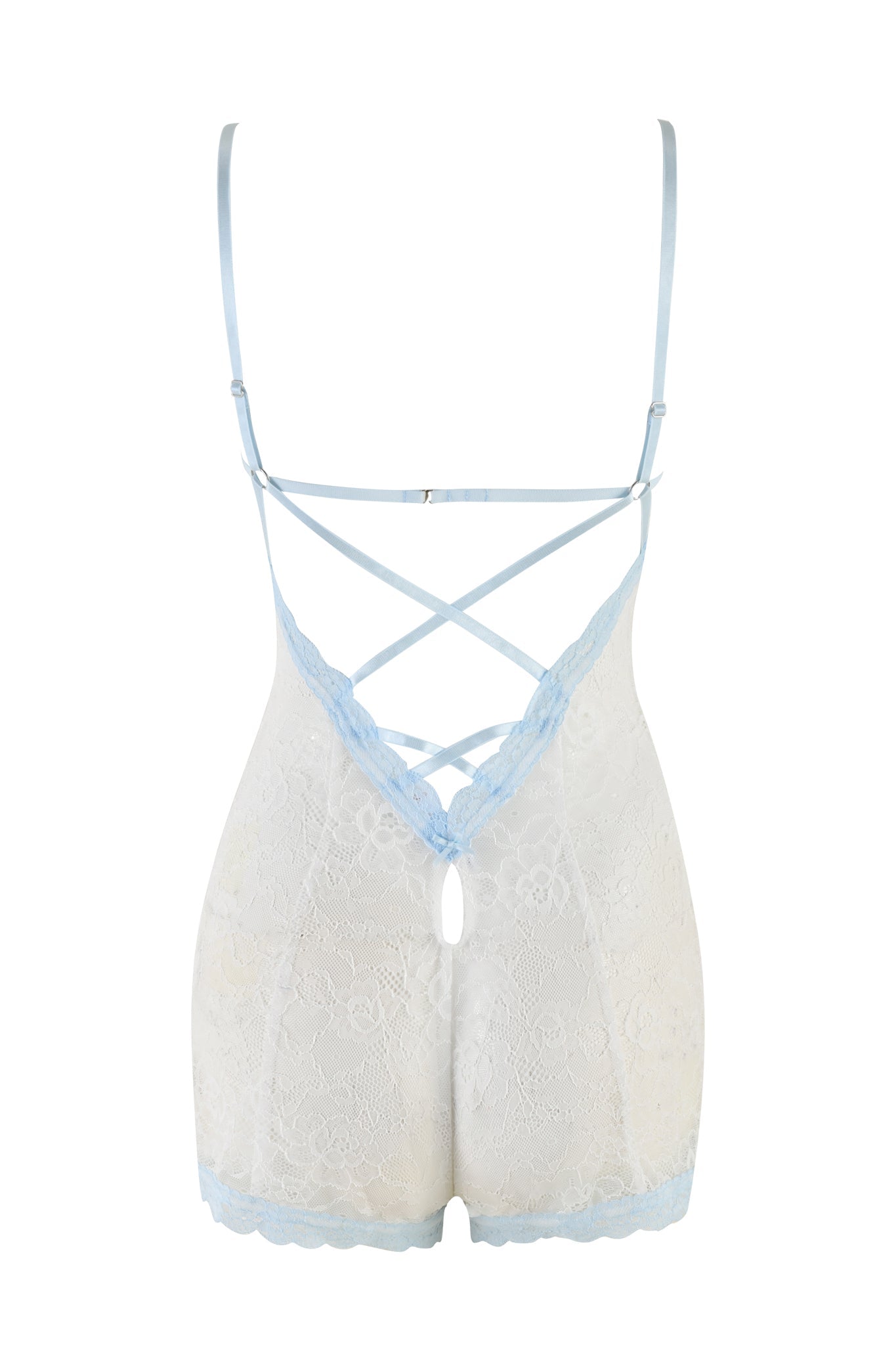 The SERINA ROMPER - WHITE : LACE by I.AM.GIA is displayed from the back, showcasing light blue detailing against a white lace fabric. Its design includes criss-cross straps and a keyhole cutout near the waistband. The adjustable straps and sheer material emphasize intricate stretch lace patterns, providing a delicate yet captivating appearance.