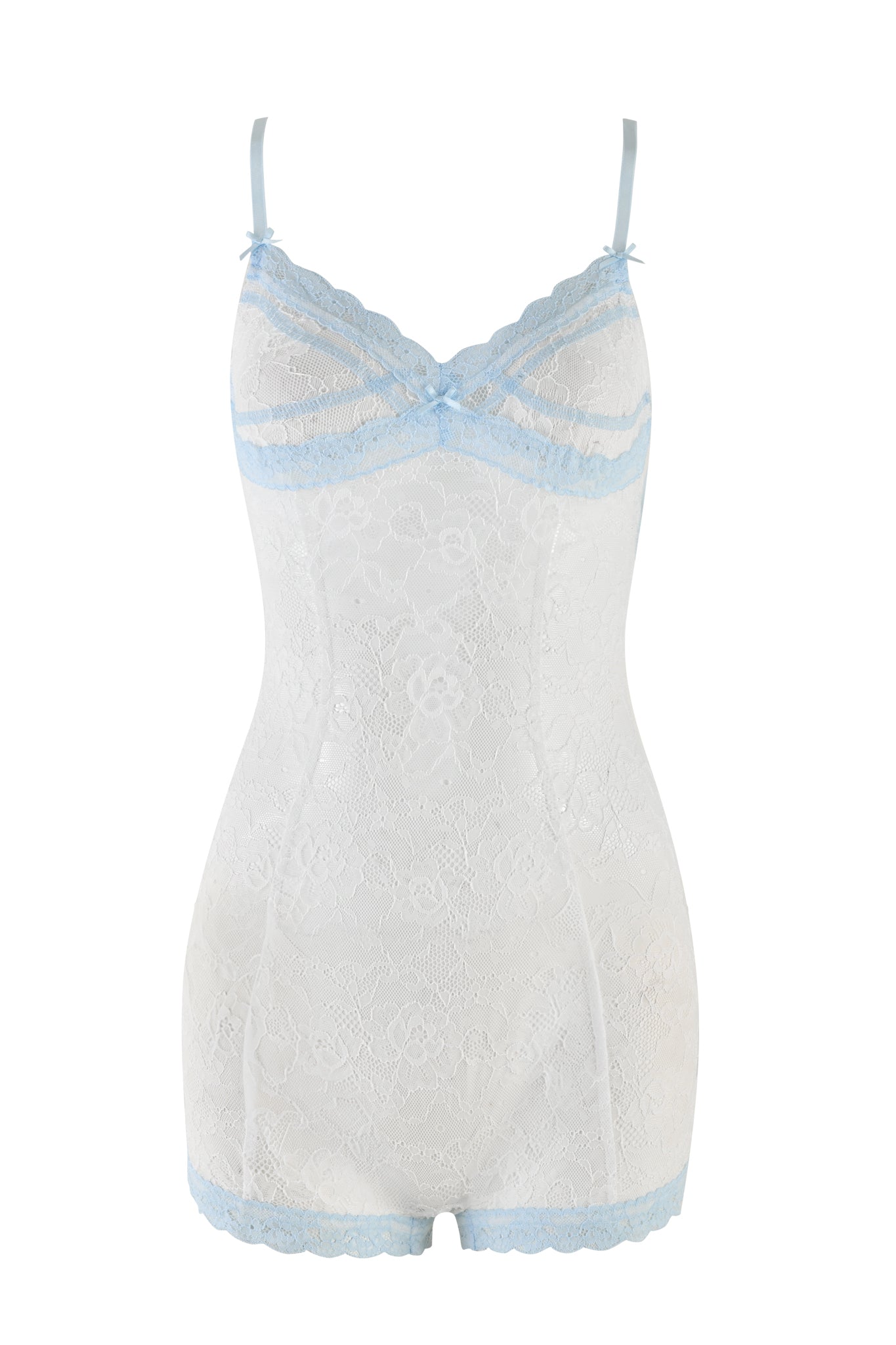 The SERINA ROMPER - WHITE by I.AM.GIA is a stunning white lace bodysuit adorned with light blue trim and bow accents. This bodycon piece features spaghetti straps, intricate floral lace detailing, and a flattering form-fitting design. Delicate blue lace trims the neckline and leg openings for an added touch of elegance.