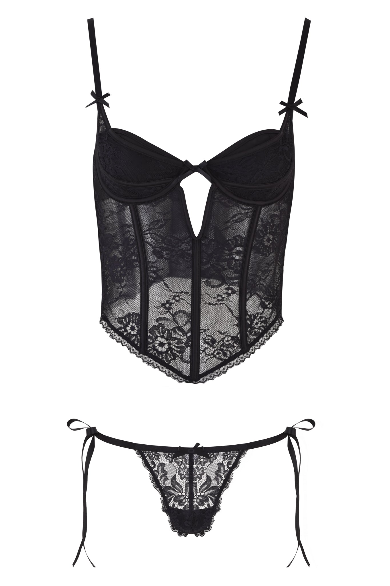 The JACQUELINE BUSTIER SET - BLACK by I.AM.GIA features a vintage-inspired sheer floral lace bustier with adjustable straps and ribbon accents, paired with a matching side-tie thong, shown on a white background.