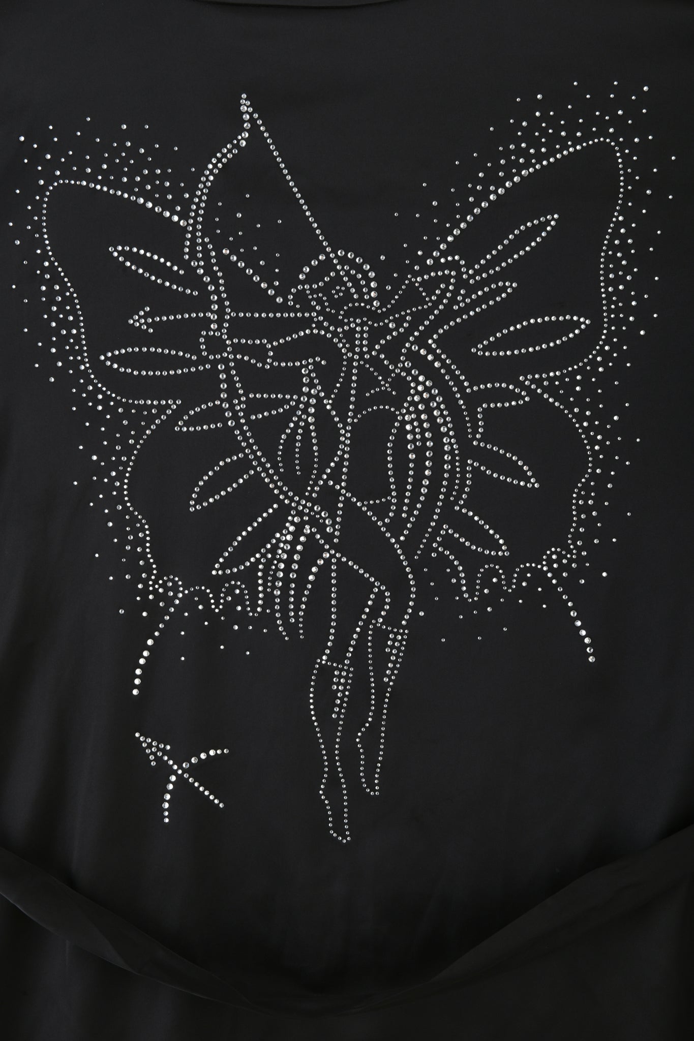 The LARSA 2.0 SLEEP ROBE by I.AM.GIA, in black, features a rhinestone design depicting an abstract fairy or angel with wings intertwined with sparkling lines and dots, evoking the mystical charm of butterfly diamante artwork.