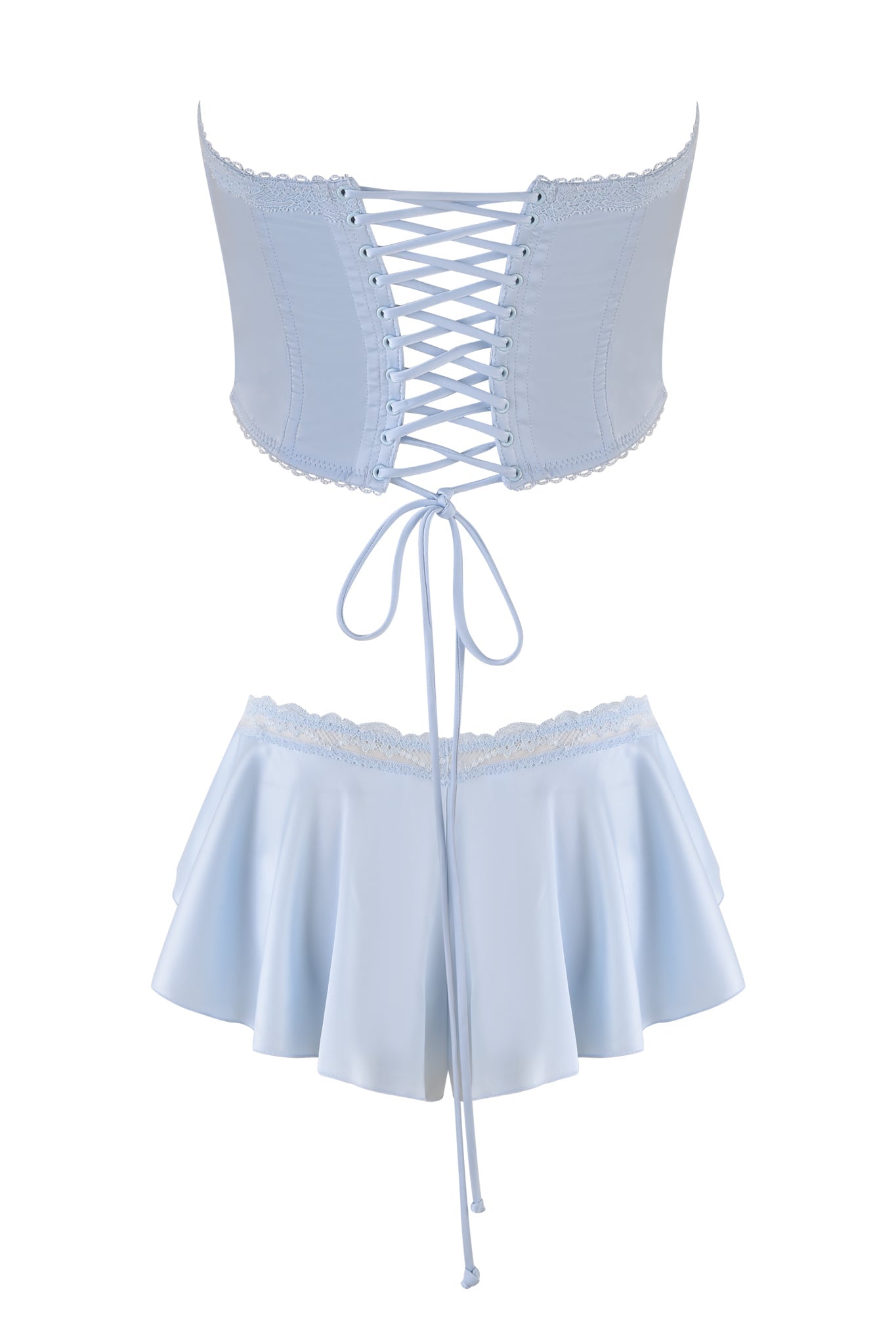 The BRIDGET BUSTIER SHORT SET - BLUE by I.AM.GIA includes a light blue corset with lace-up detailing, white stretch lace trims, and back tie, paired with a matching miniskirt featuring waist trim. Both pieces have a vintage-inspired satin-like finish.