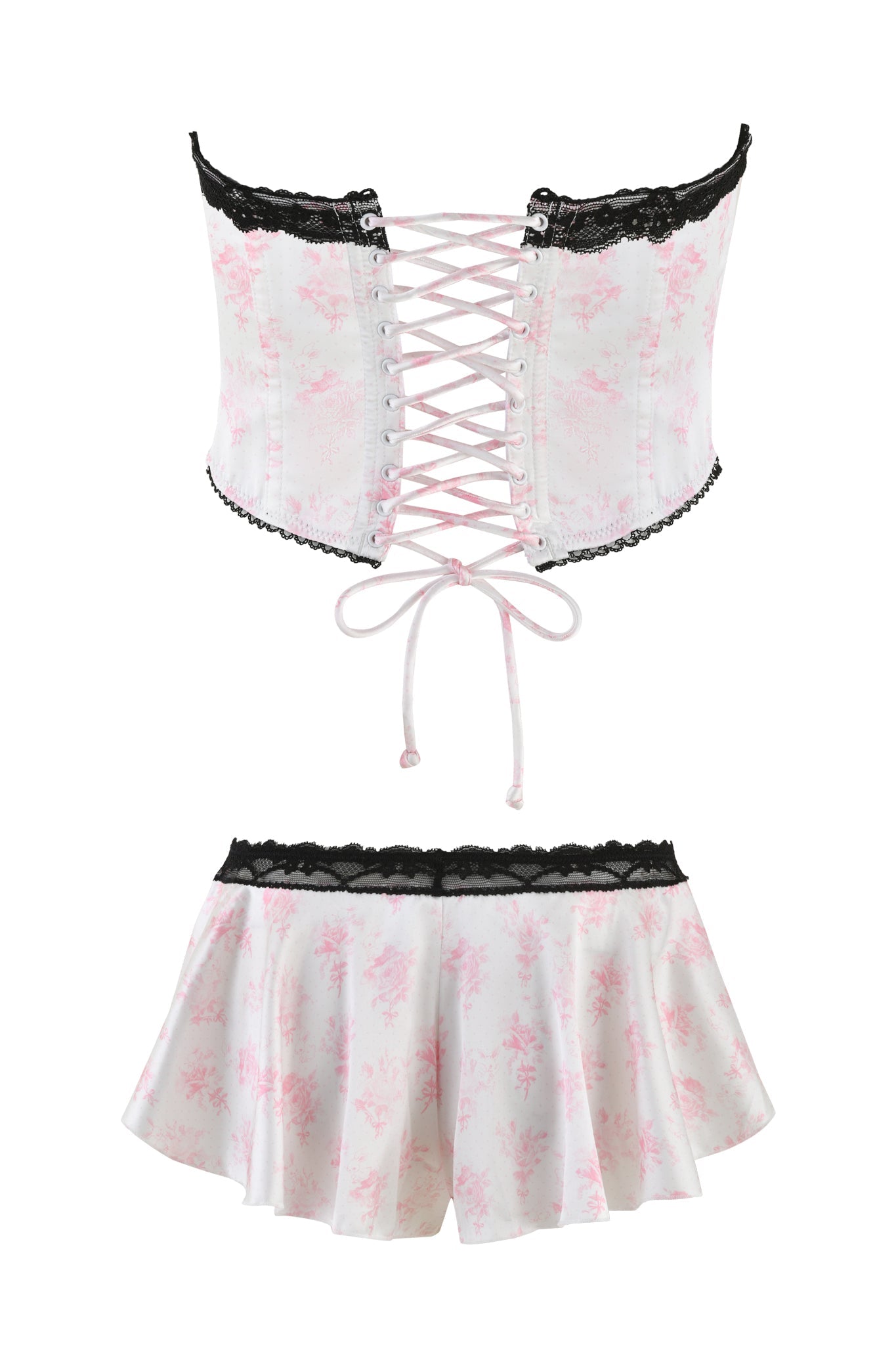 The Bridget Bustier 2 Piece Set - Pink: Floral by I.AM.GIA features a vintage-inspired bustier with pink lace-up detailing and black lace trims, perfectly paired with matching floral shorts. The shorts showcase a flared design and a black lace waistband. Crafted from white fabric adorned with a charming pink floral print, this set offers a touch of romantic elegance.