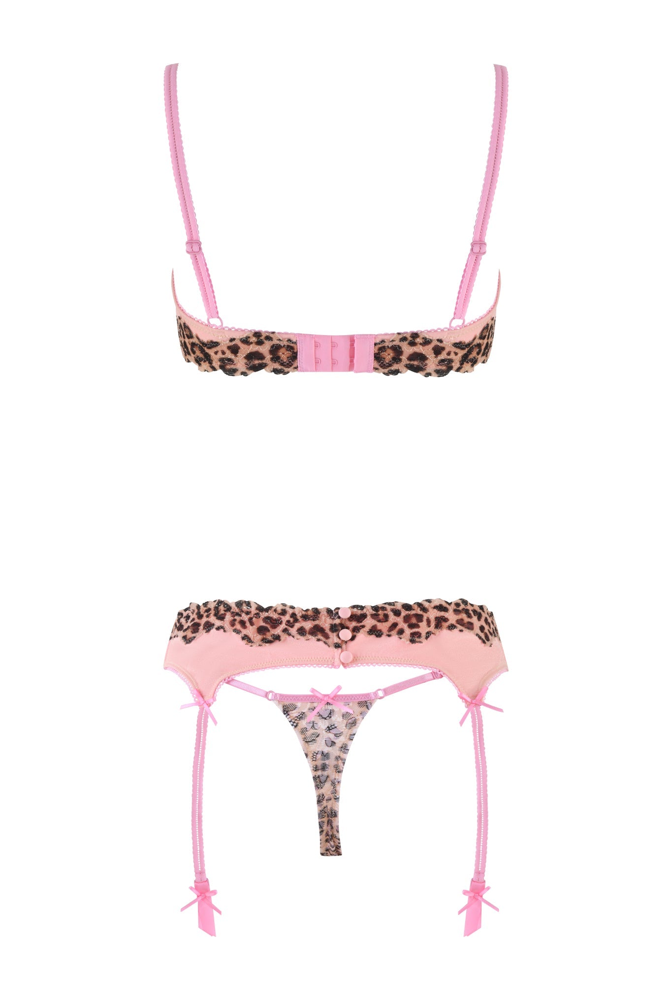 The I.AM.GIA Amari 3 Piece Set features a vintage-inspired design in leopard lace with pink accents. It includes a bra with animal print cups and pink straps, a garter belt equipped with matching pink bows and straps, and complementary panties.