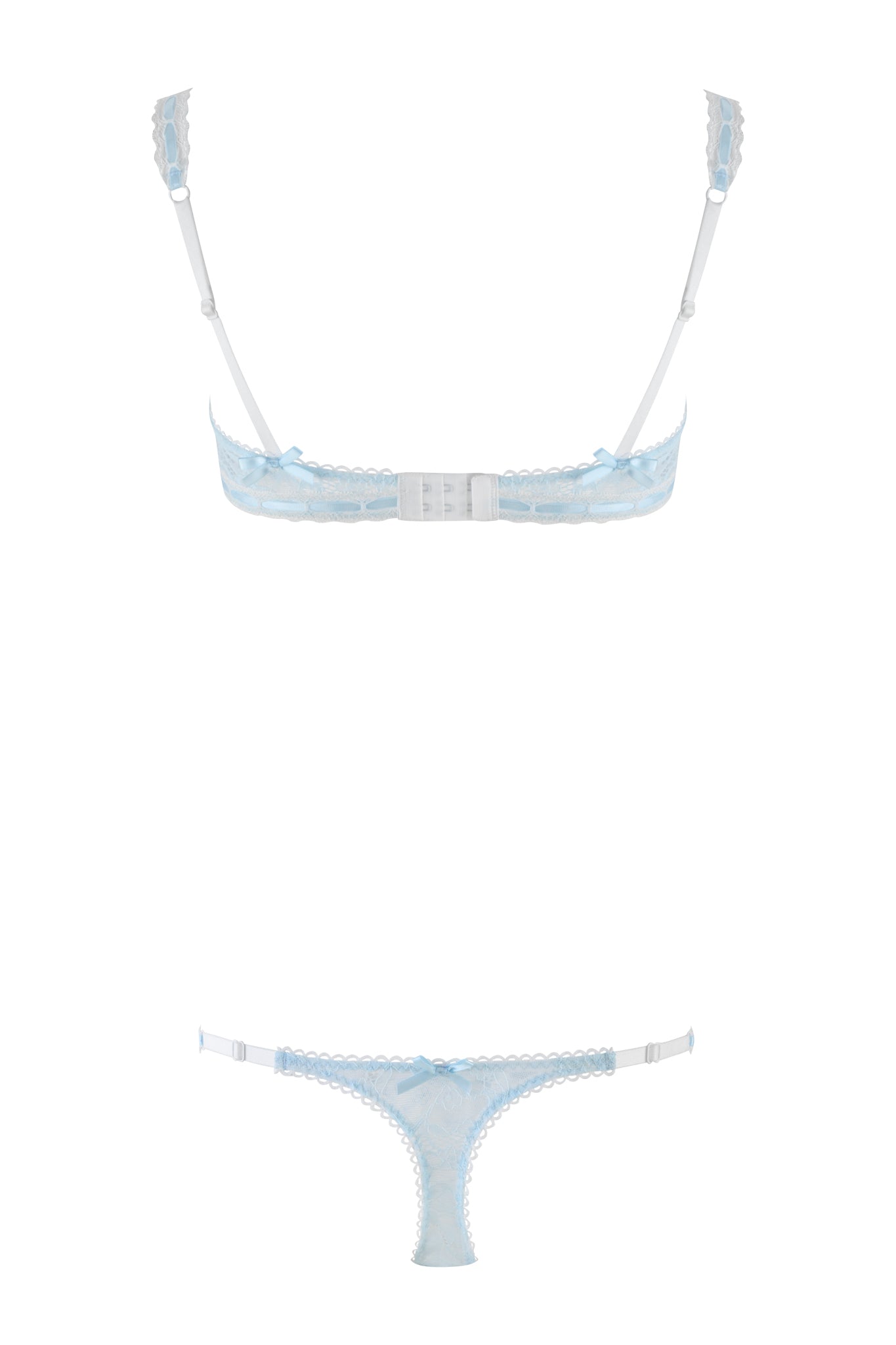 The ROMY 2 PIECE SET - BLUE by I.AM.GIA features a light blue embroidered daisy lace bra with adjustable straps and a hook closure, paired with a thong adorned with a front bow, all displayed on a plain white background.